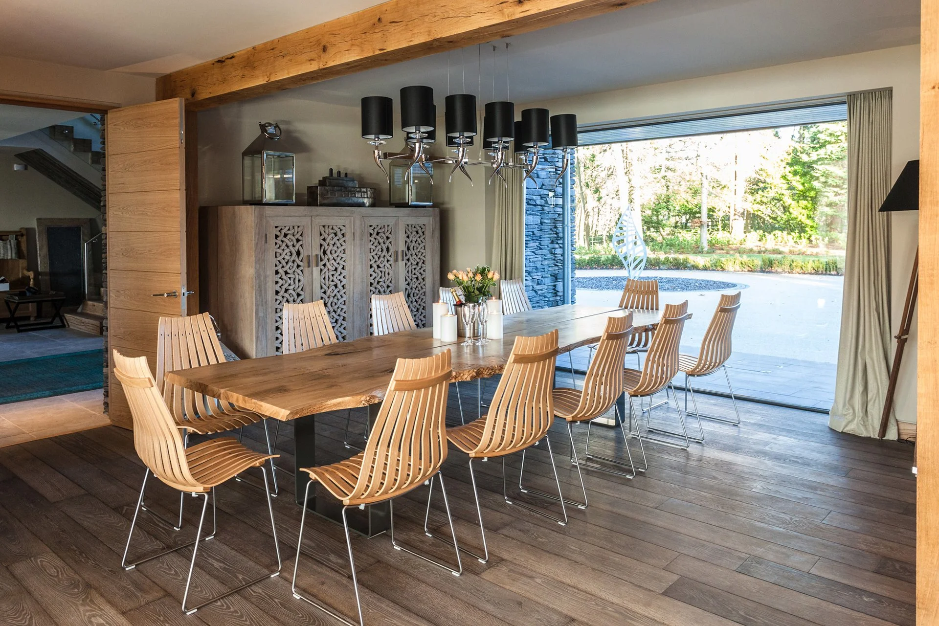 The formal dining area, with a bespoke 3.5m, log-edge, 12-seater Whetstone Oak table.