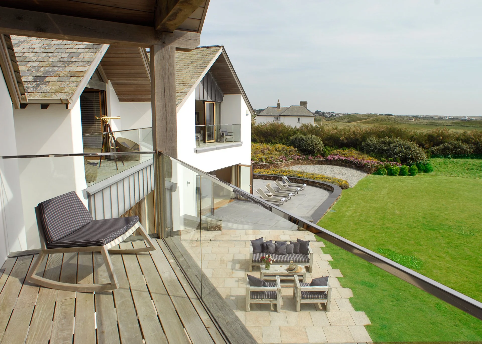 Swathed in glass and timbered gables, Little Polgarron is the ultimate Cornish beach house accommodating up to 10 guests and located next to the prestigious Trevose Head golf course and just a few minutes' walk from the beach at Booby's Bay. This is 