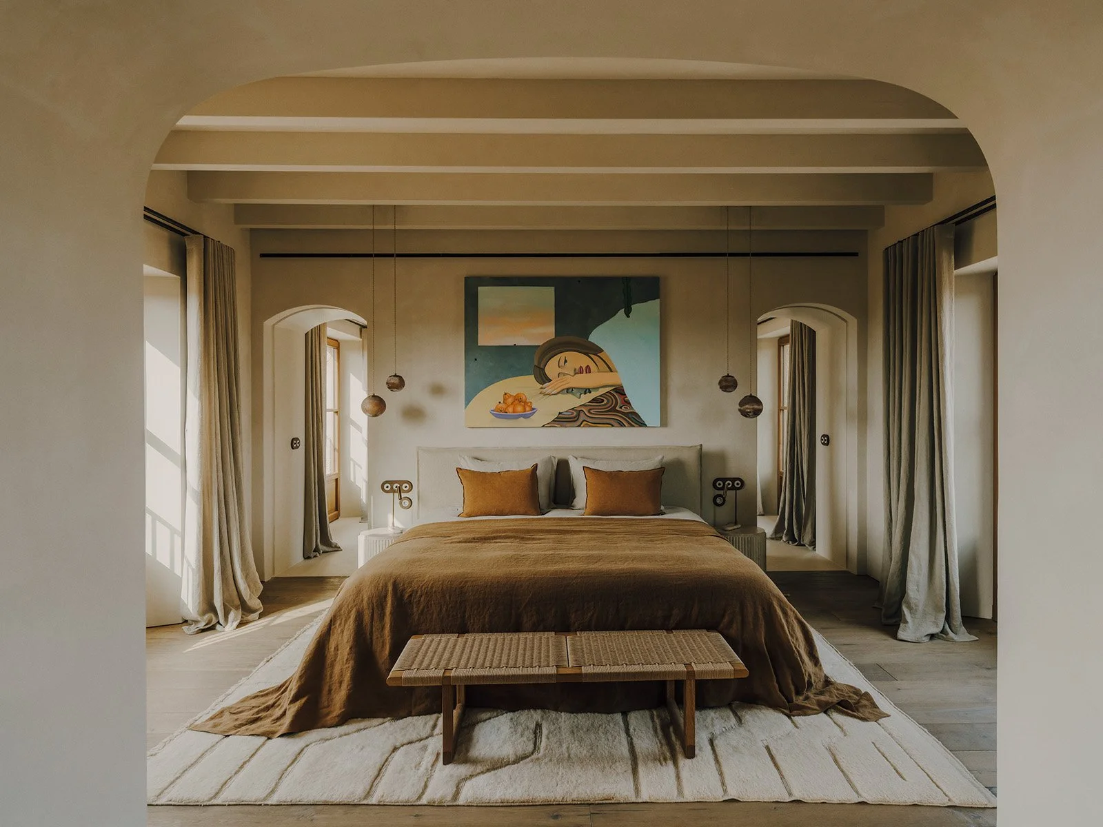 The Master bedroom, located on the first floor, has both a free-standing bath and separate shower. Its own private terrace with bench seating and far-reaching countryside mountain views.