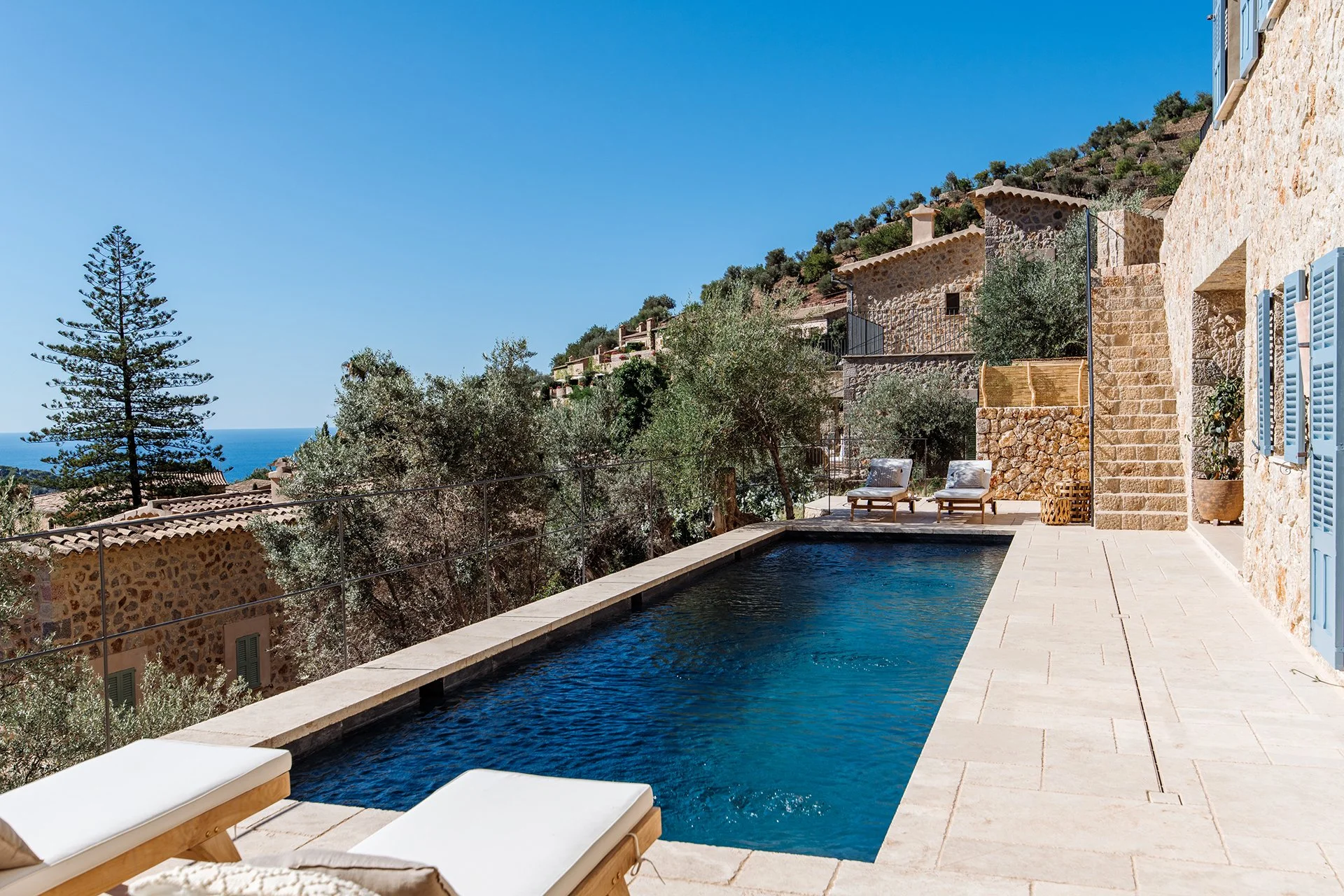 Outside, cool off in the large private pool or relax on a choice of different sun terraces, to take in the enviable views.