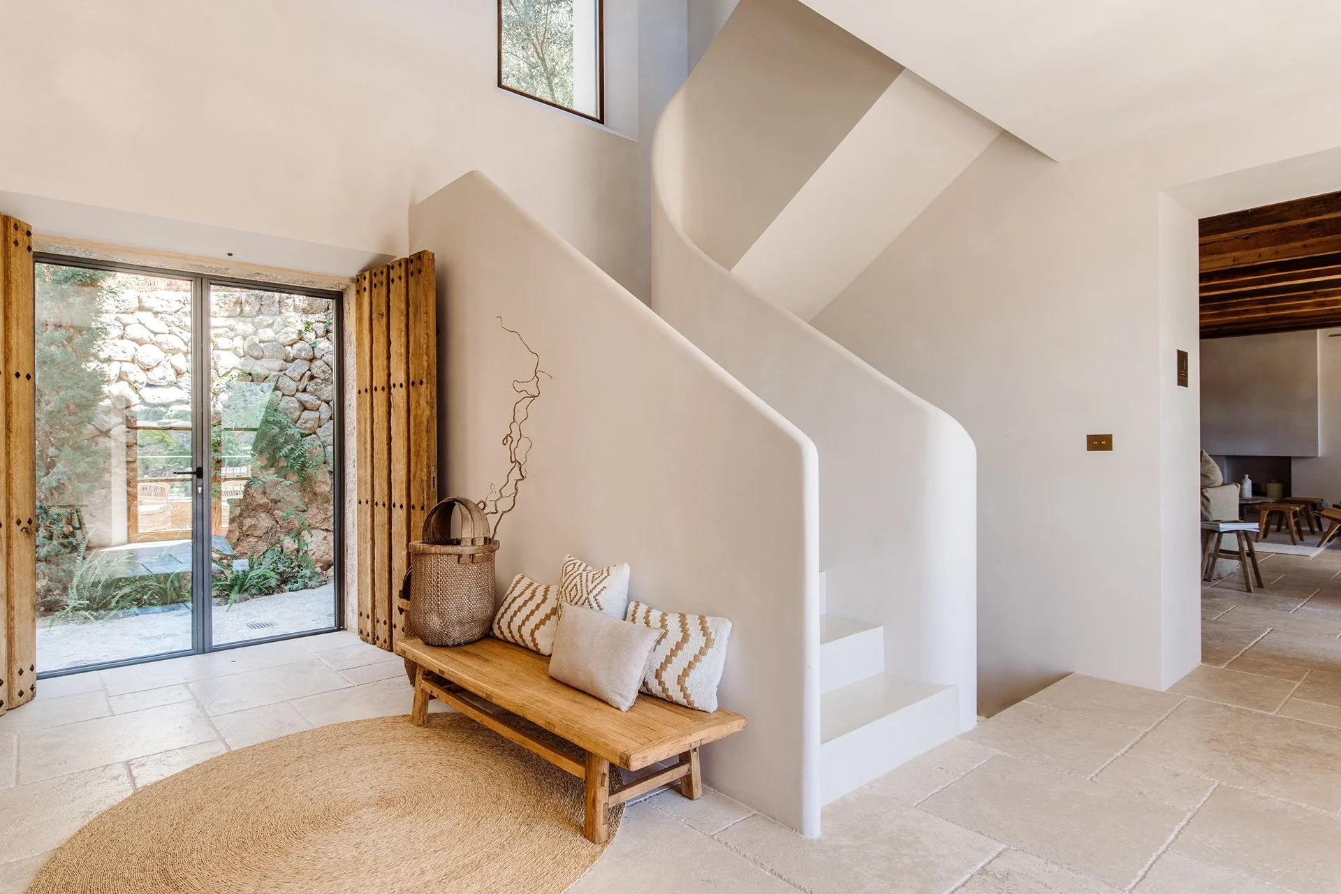 The house’s fresh sun-bleached walls with warm earthy hues and spacious open-plan areas are brimming with natural light, exquisite Spanish art and bespoke furniture.