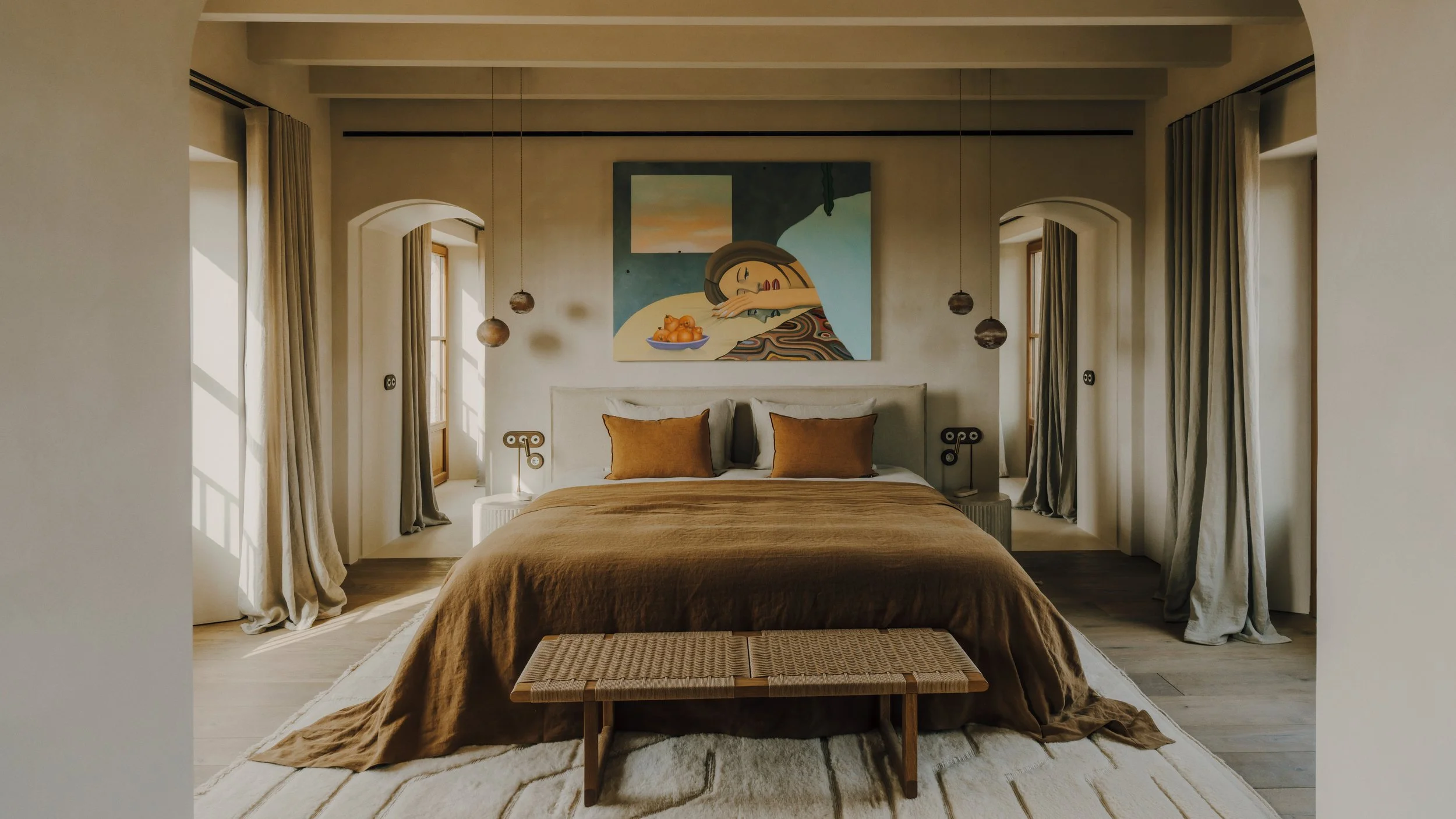 The Master bedroom, located on the first floor, has both a free-standing bath and separate shower. Its own private terrace with bench seating and far-reaching countryside mountain views.