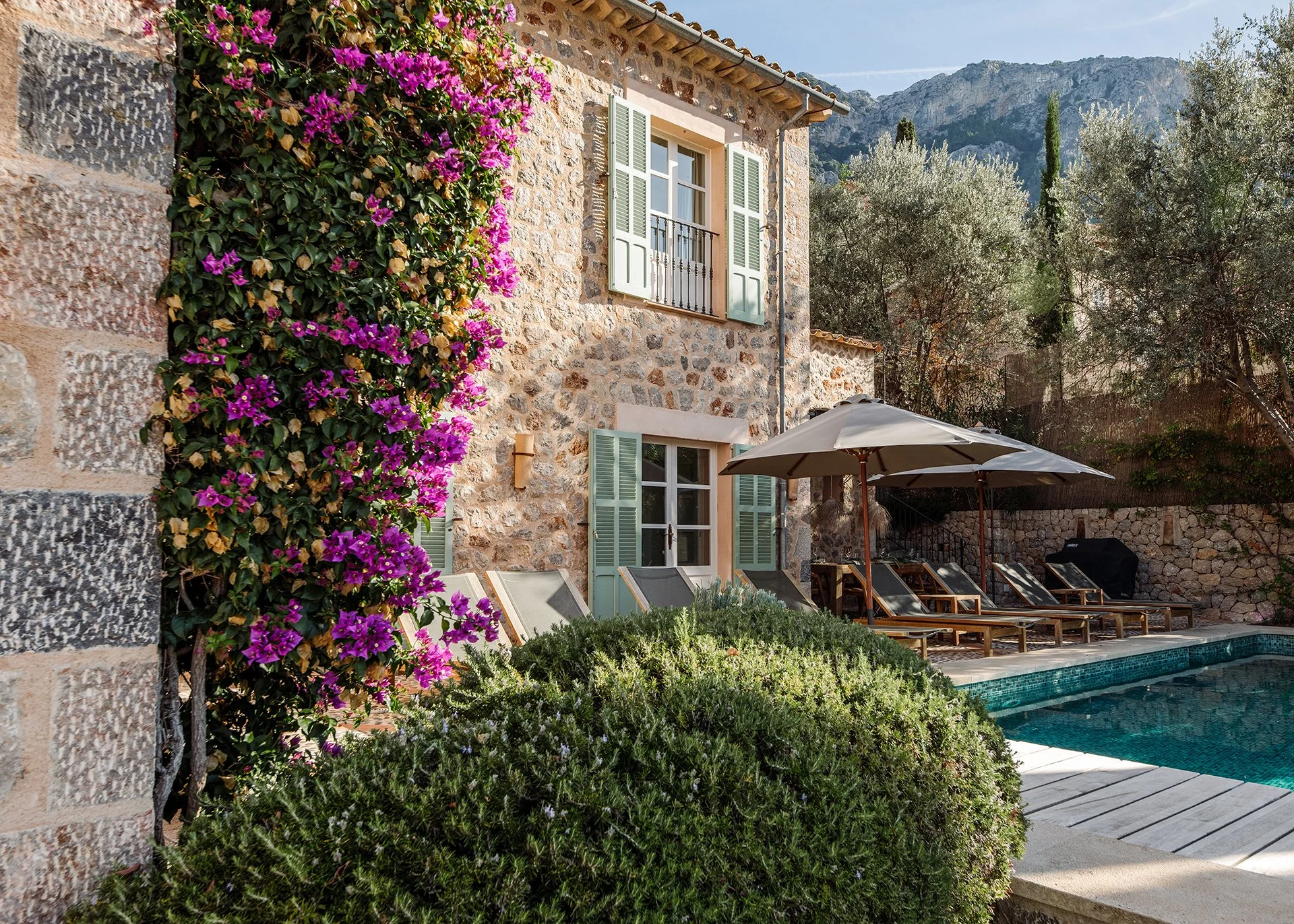 Take a dip in the pool with swim-jet, or relax on the terrace with its uninterrupted village and mountain views. Sun loungers and comfy chairs are well placed as well as parasols. Olive and Cypress trees surround the pool with pink bougainvillea cree