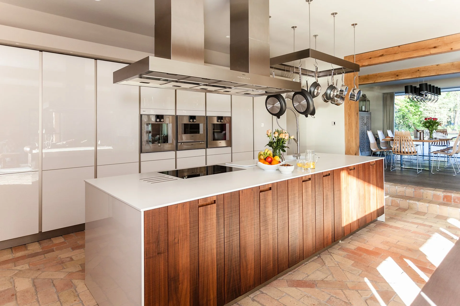 The kitchen is fully equipped with the latest mod cons, including a convenient Quooker tap and three cookers. Quality appliances are by Gaggenau, and the furniture comes from Ralph Lauren, Andrew Martin and Van Thiel.