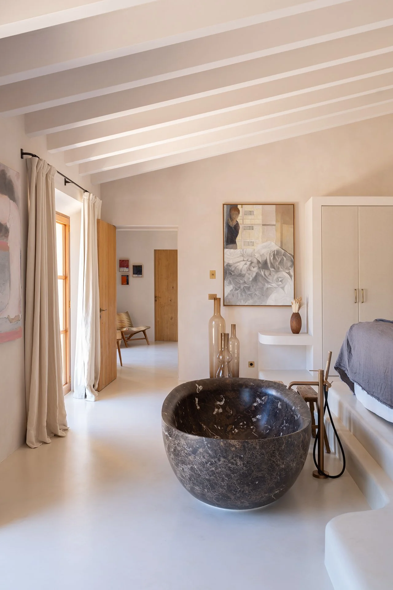 The Master bedroom, located on the first floor, has both a free-standing bath and separate shower.