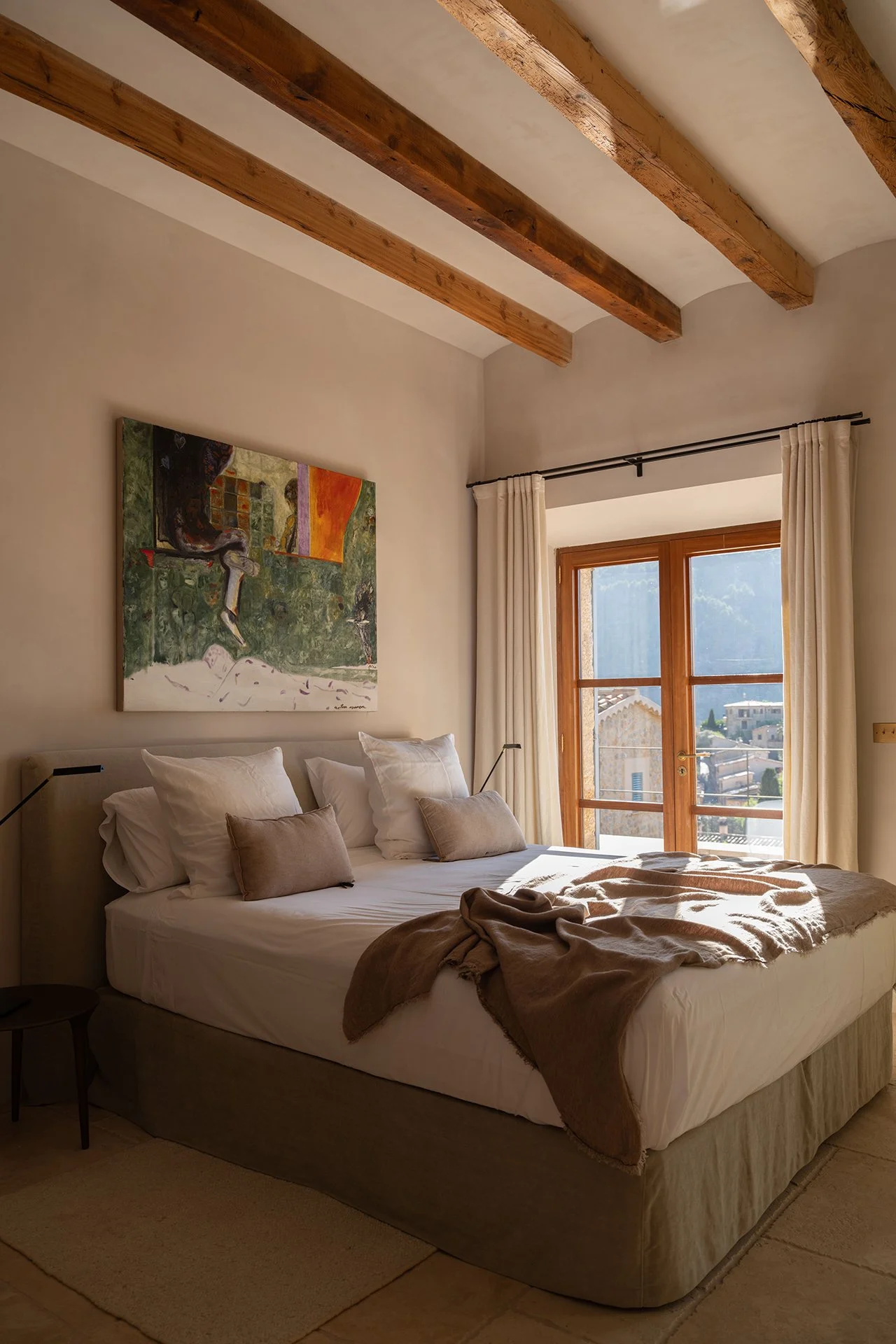 Four luxurious double bedrooms, set over 2 floors and furnished with bespoke furniture, sumptuous linens and unique design pieces. All have fabulous mountain and village views with en-suite stone, slate and marble shower rooms.