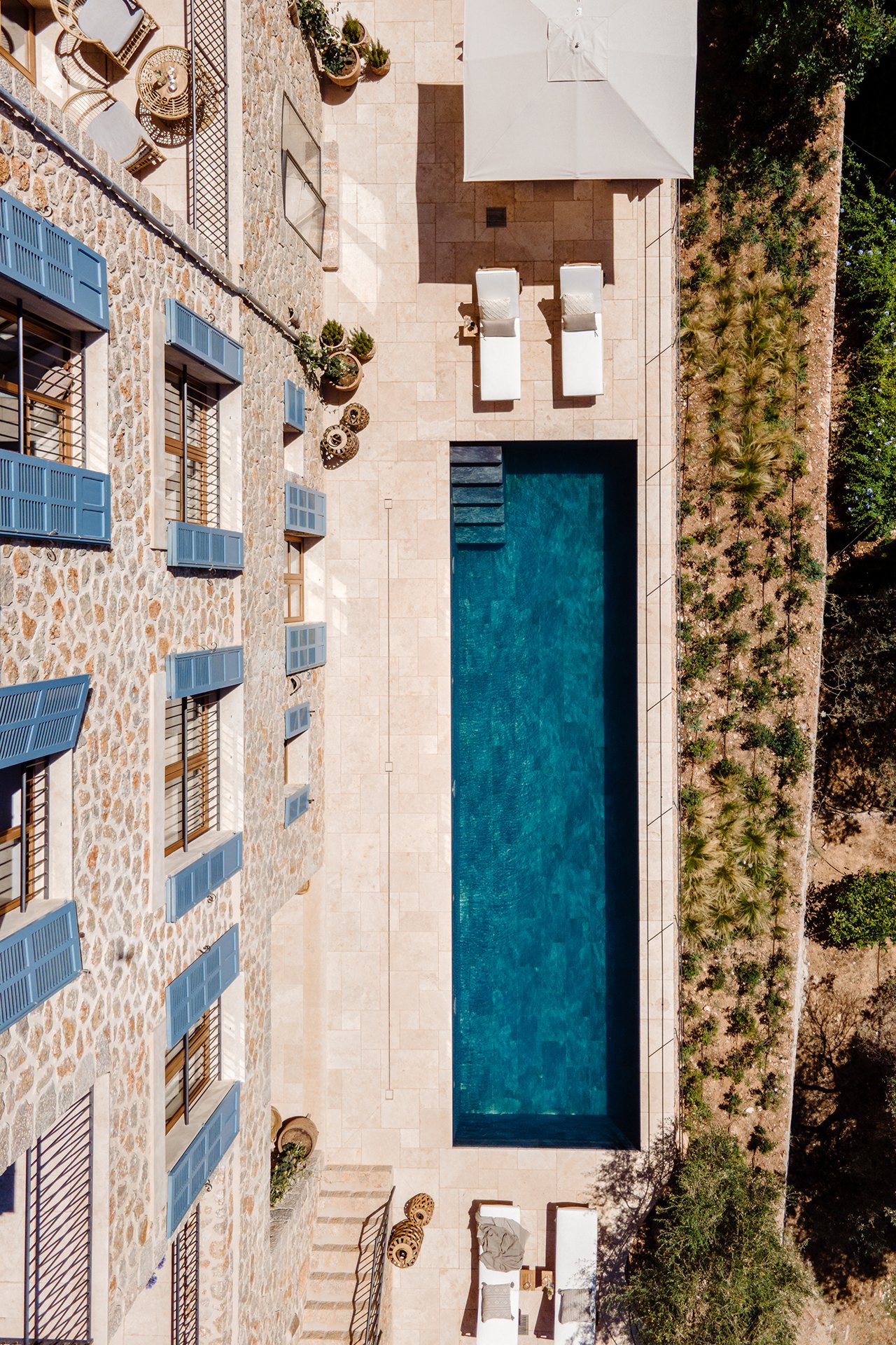 Take a dip in the sleek, generously sized pool, ideal for morning laps or relaxed afternoon dips.