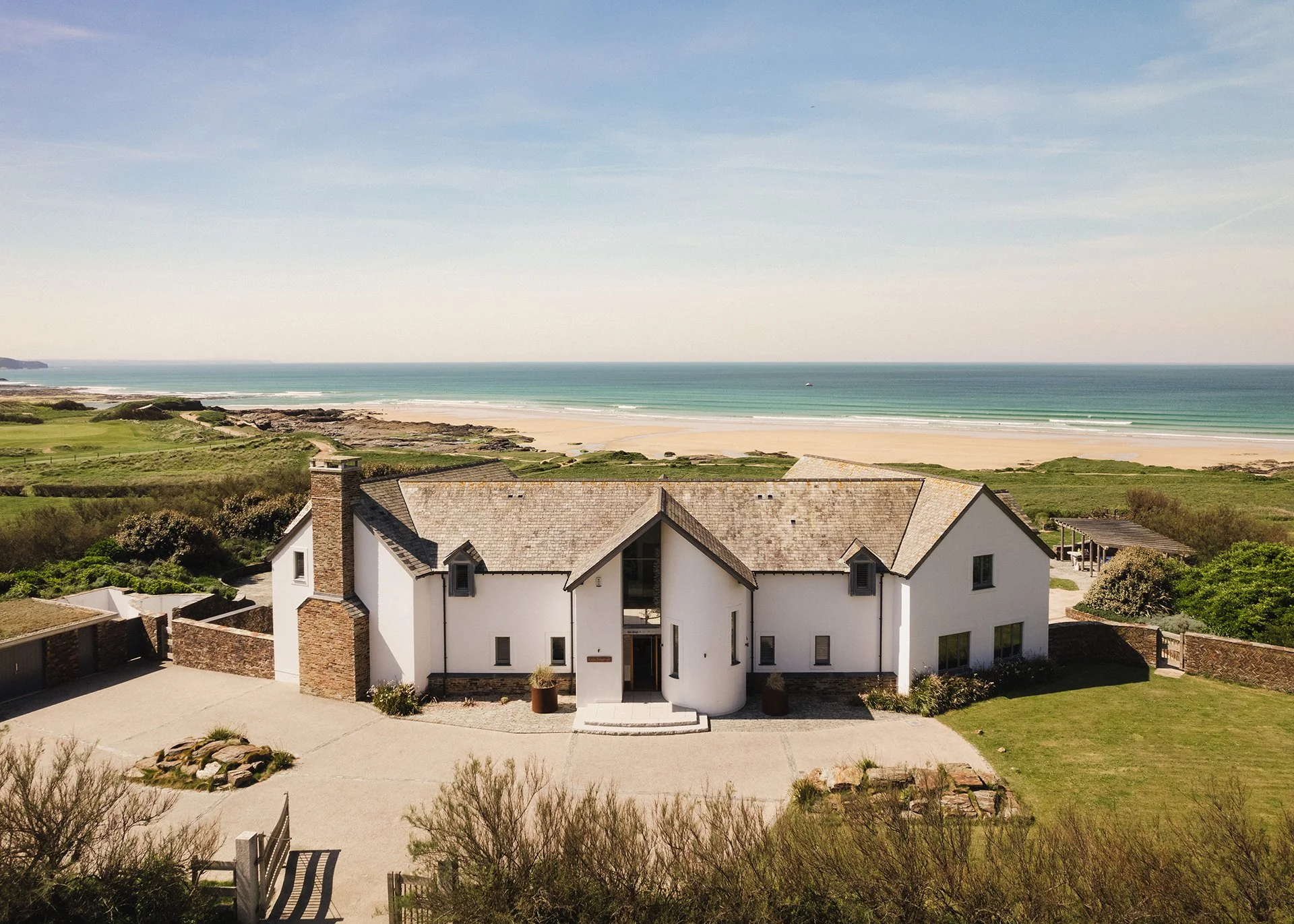 Swathed in glass and timbered gables, Little Polgarron is the ultimate Cornish beach house accommodating up to 10 guests and located next to the prestigious Trevose Head golf course and just a few minutes' walk from the beach at Booby's Bay. This is 