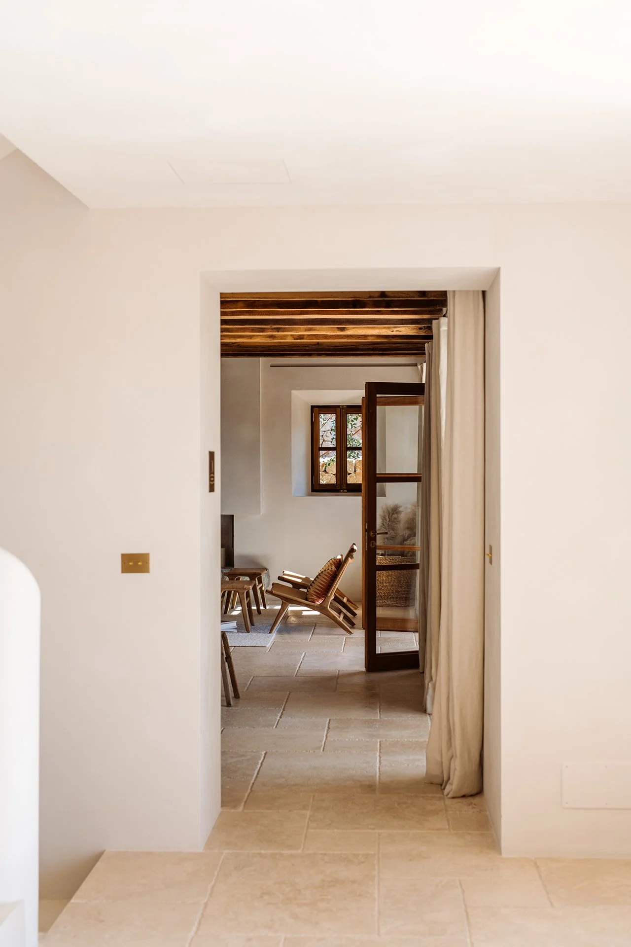 The house’s fresh sun-bleached walls with warm earthy hues and spacious open-plan areas are brimming with natural light, exquisite Spanish art and bespoke furniture.