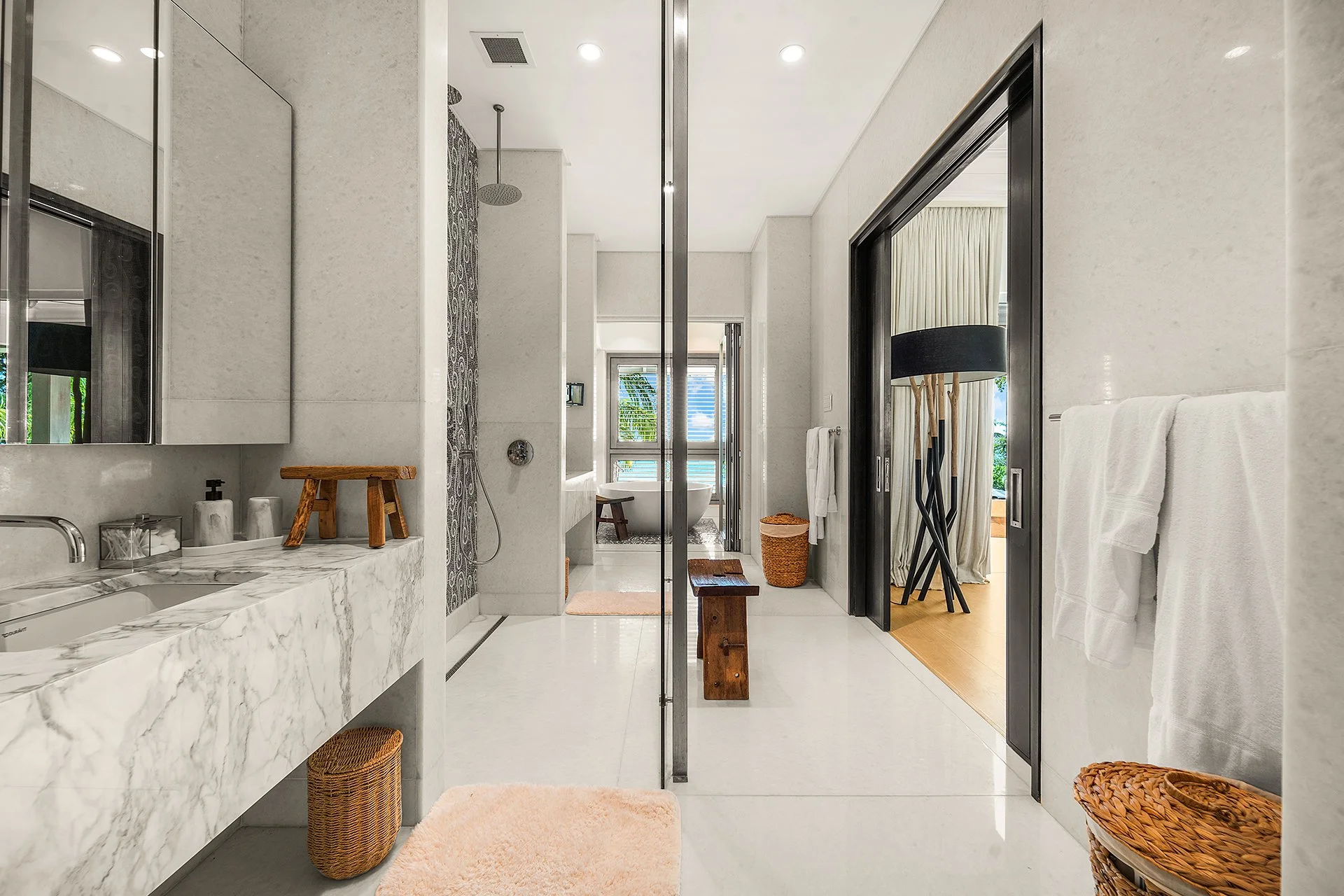 Each bedroom has a walk-in dressing room, private terrace and luxury bathroom furnished with Hansgrohe rain shower, mosaic tiles from Ann Sacks and marble vanities.