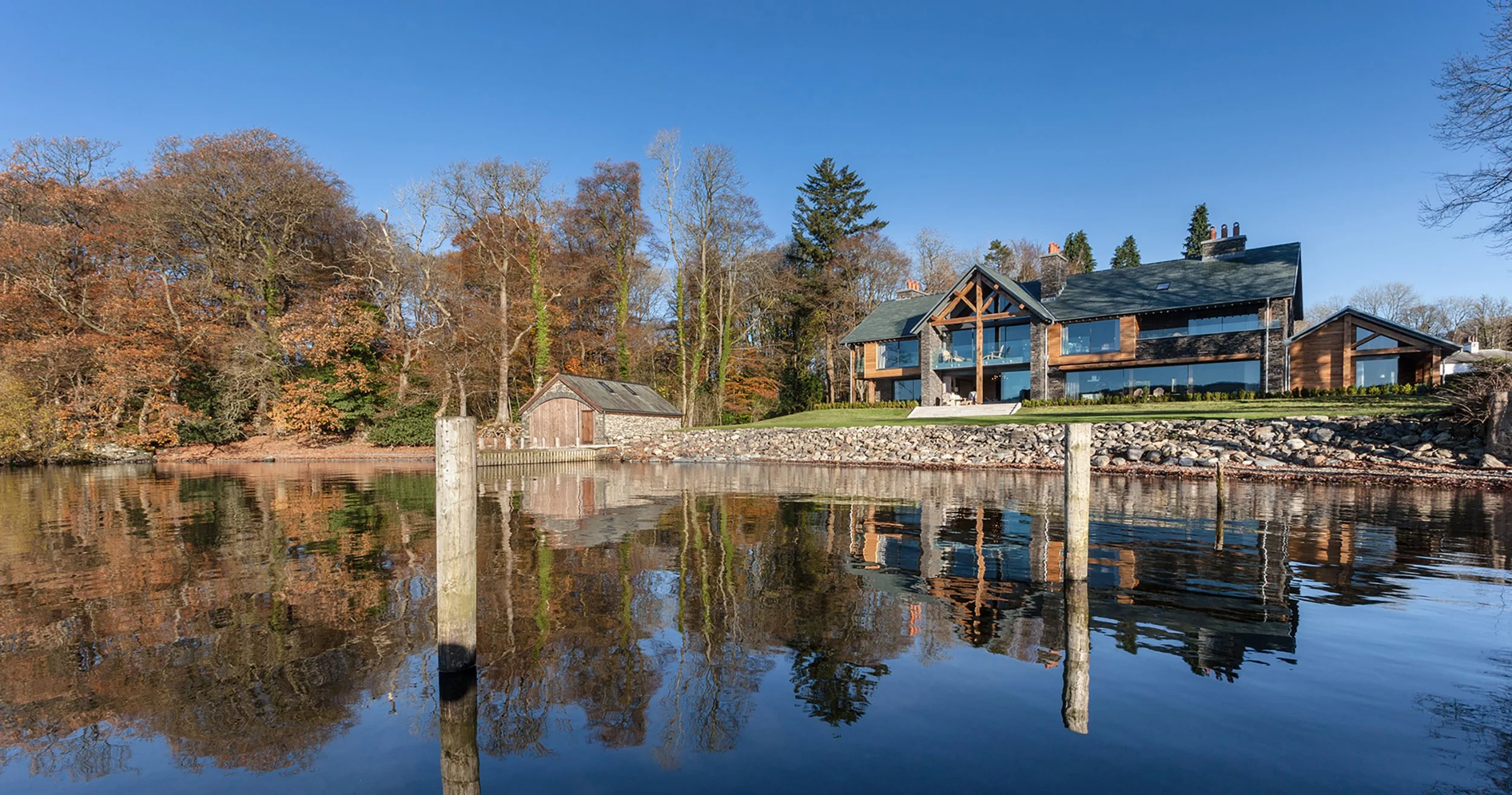 This impressive, ski chalet-style house sits directly on Lake Windermere, a short drive from Bowness. Boasting uninterrupted lake views and its own jetty, Grey Gables features a home cinema room and a games room with 8ft pool table.