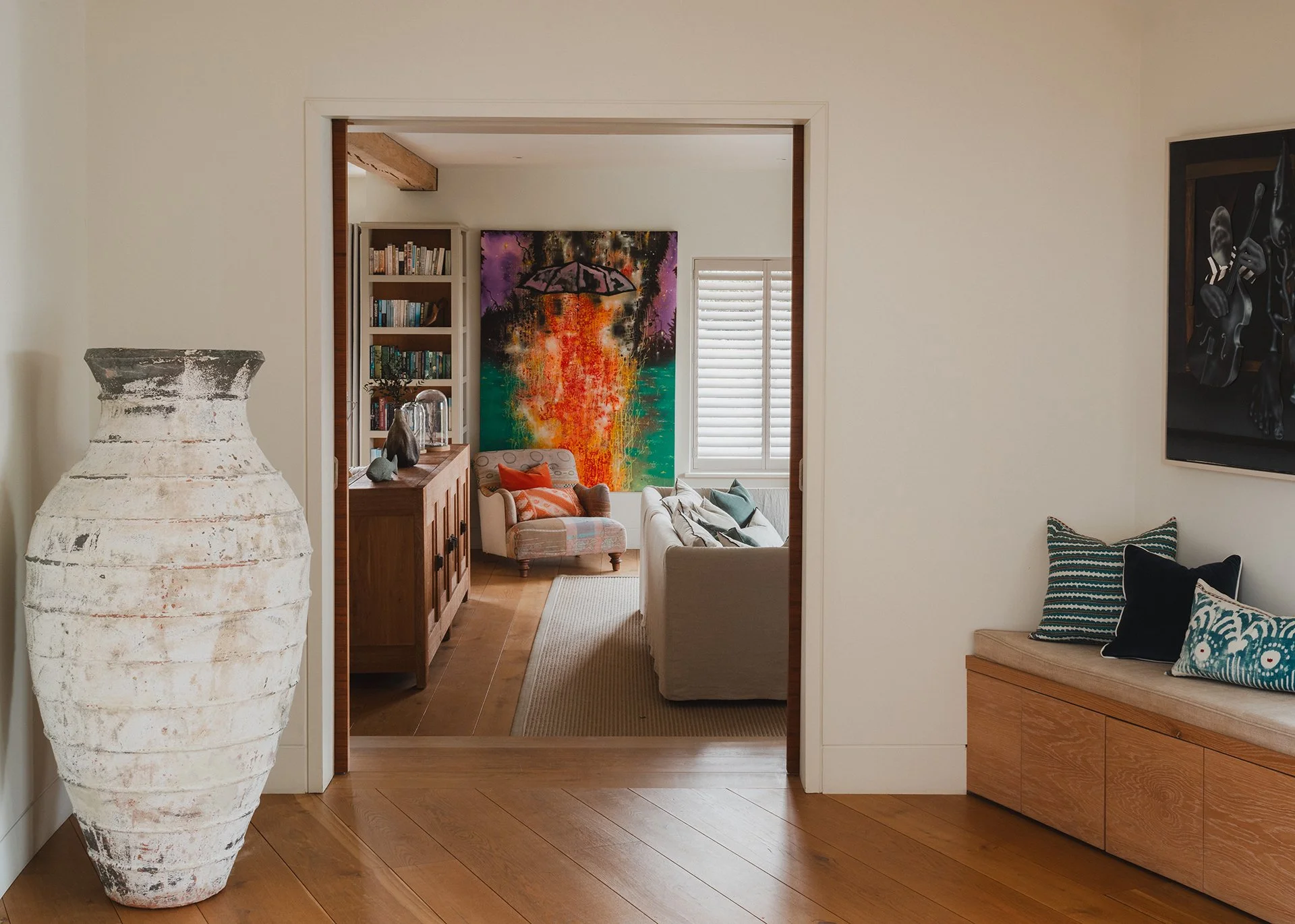 The living room’s homely feel is boosted by its Stuv woodburner, inviting sofas and luxury linens, leather and wood. A large round games table is perfect for late-night Scrabble and Monopoly marathons.