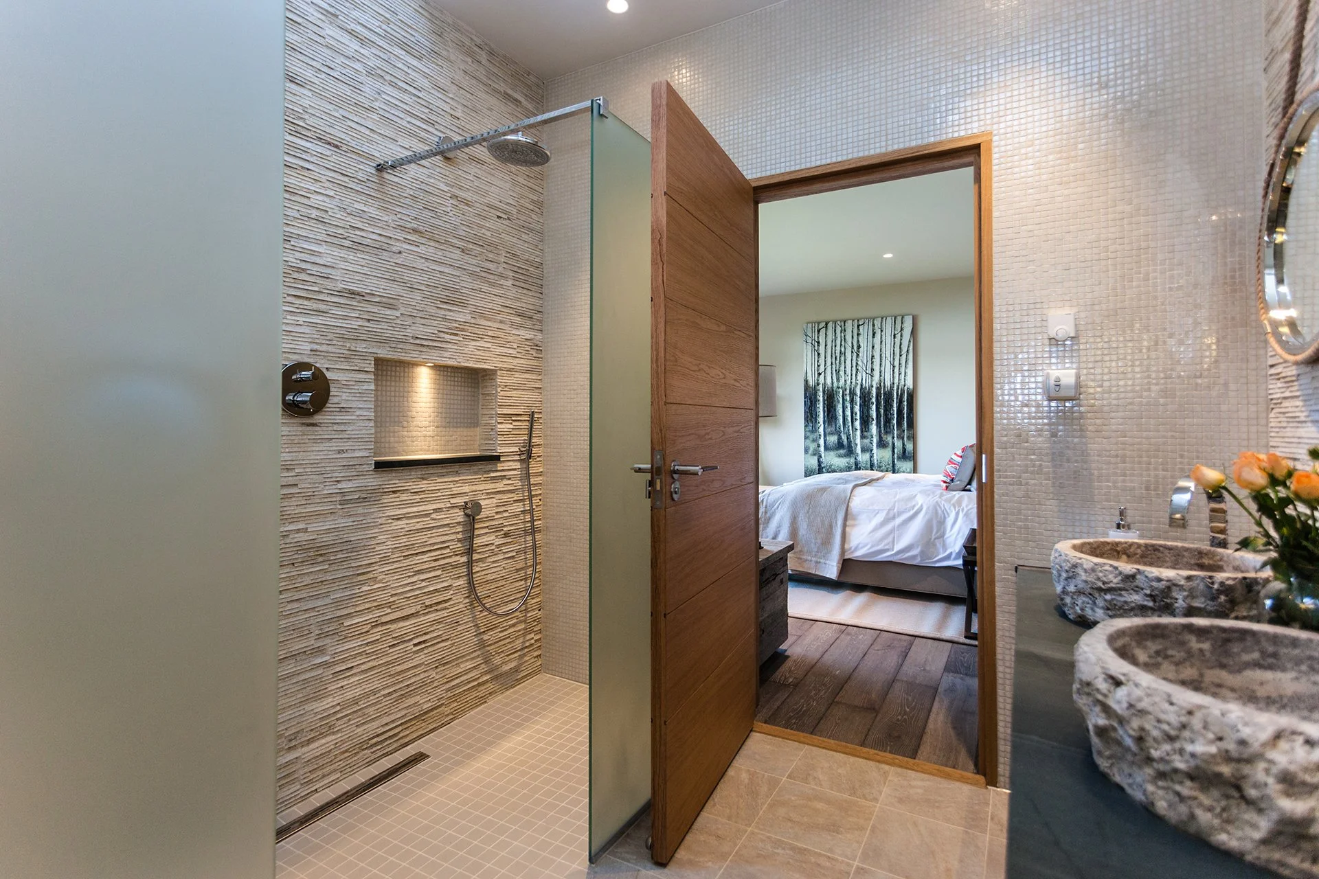 Two bedrooms have oval baths overlooking Lake Windermere. All bathrooms have Mandarin Stone walls and giant Drench showers. Escape to Grey Gables, Lake Windermere.