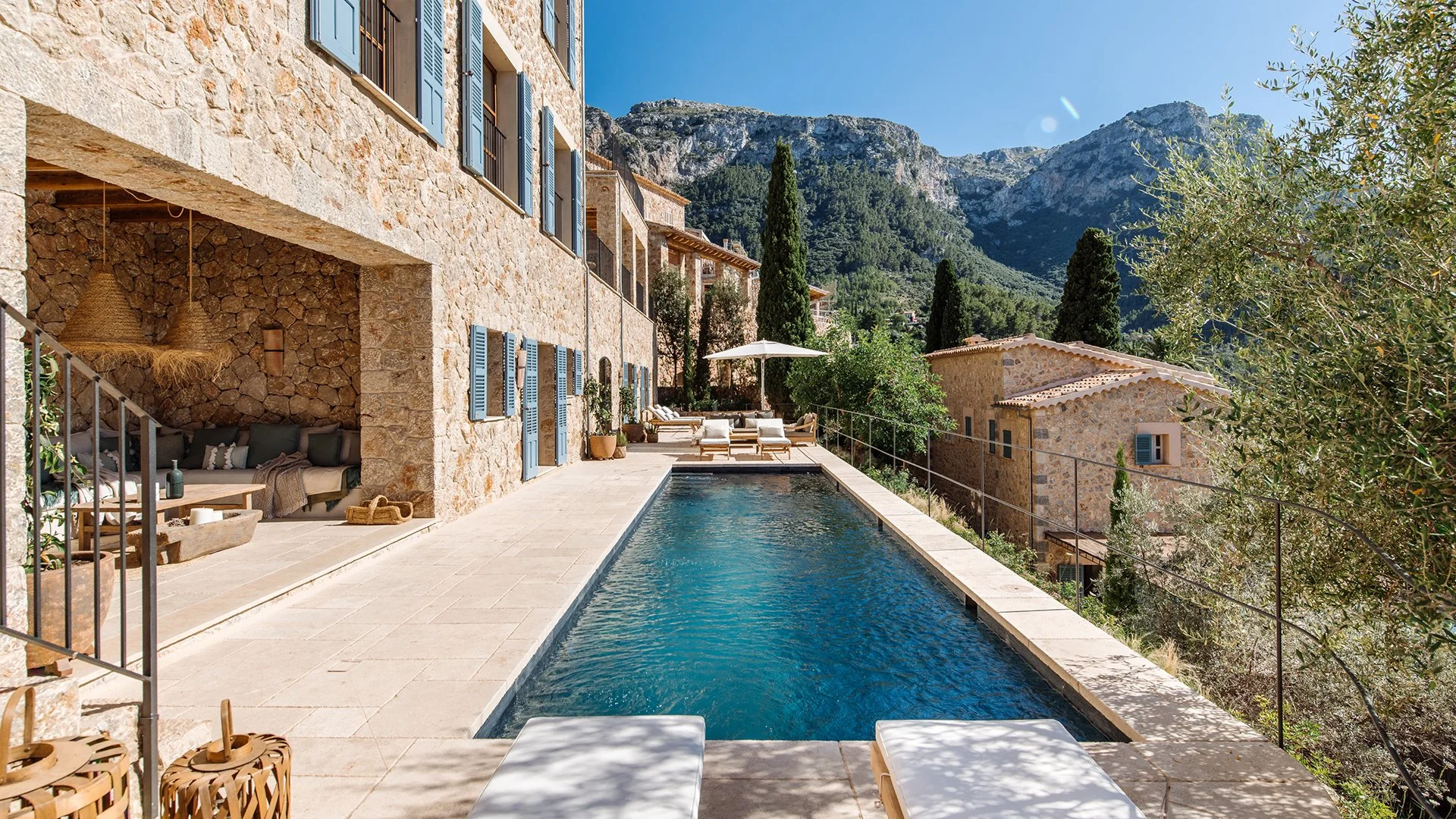 Sunlight floods the open-plan living areas, highlighting pieces by renowned designers, along with state-of-the-art appliances to make each stay as comfortable as possible. Outside, cool off in the large private pool or relax. 