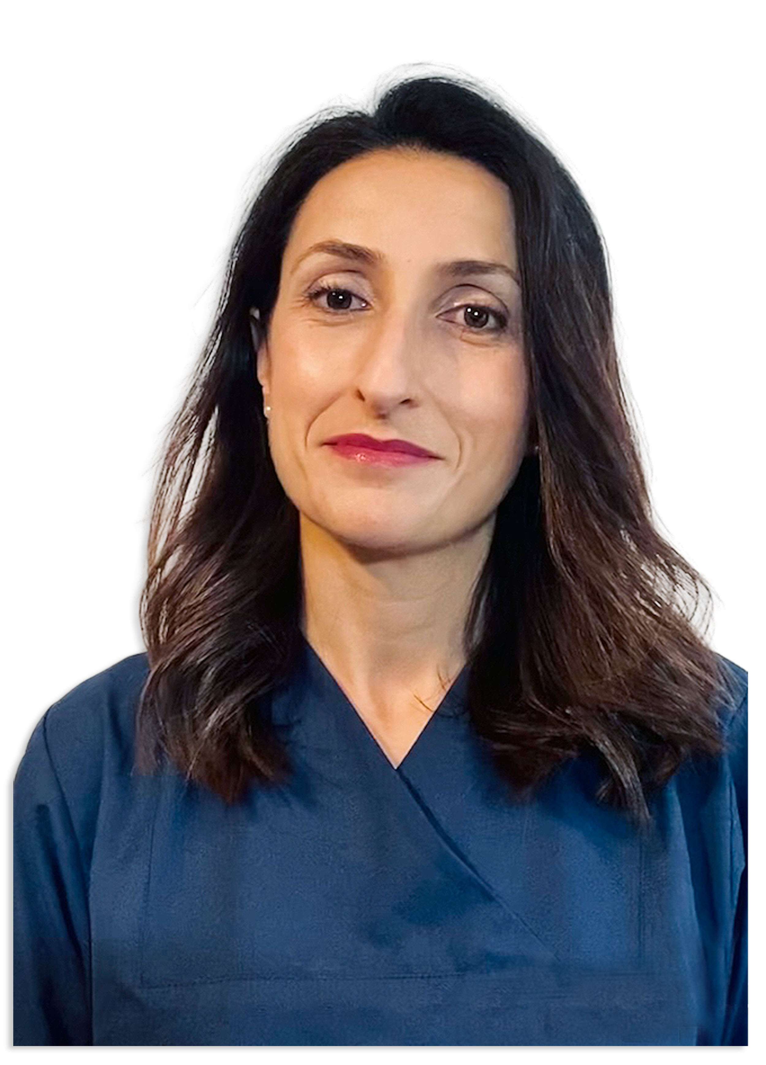 A woman with long brown hair wearing a dark blue medical scrub top.