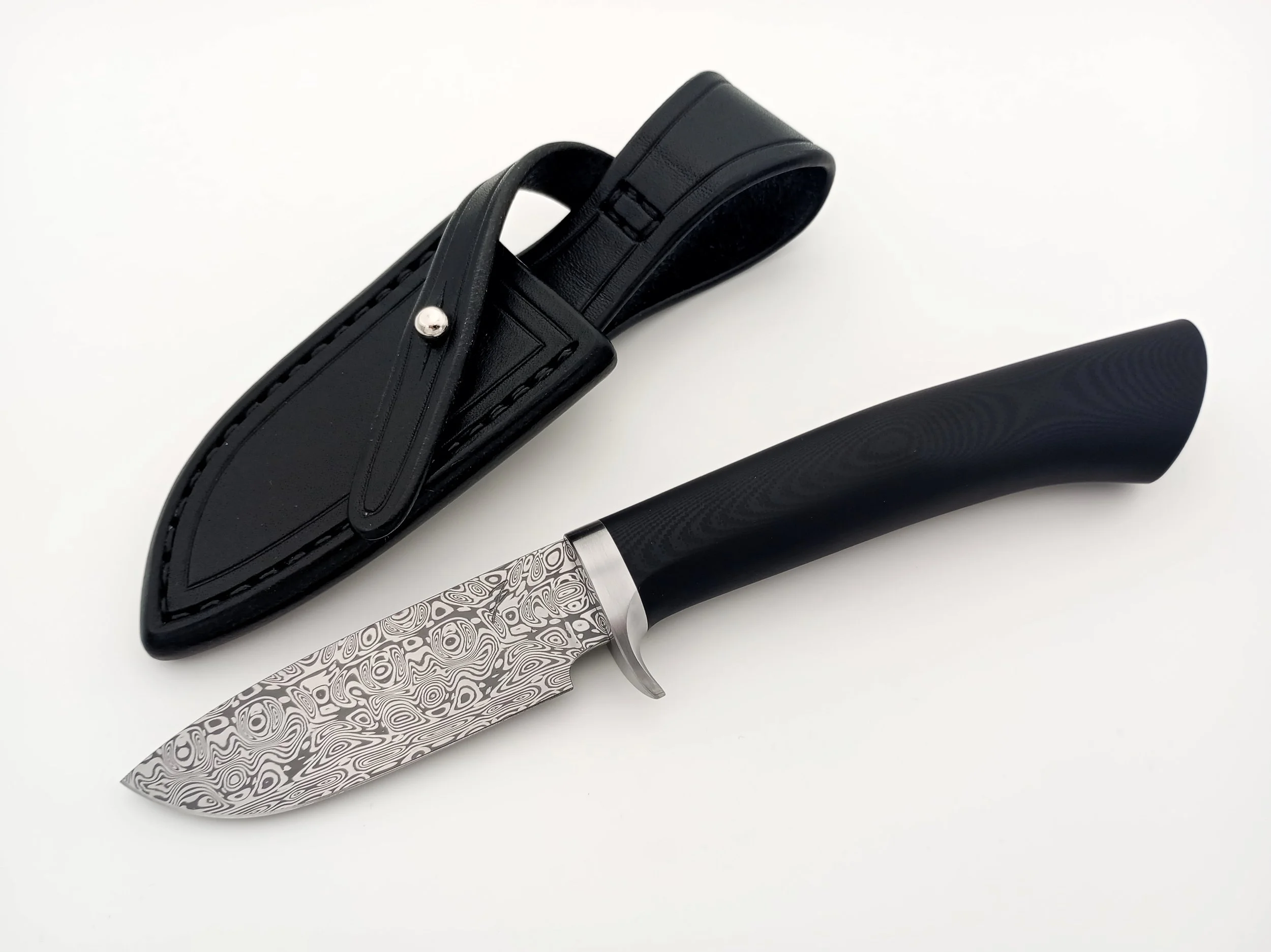 Damascus steel hunting knife.