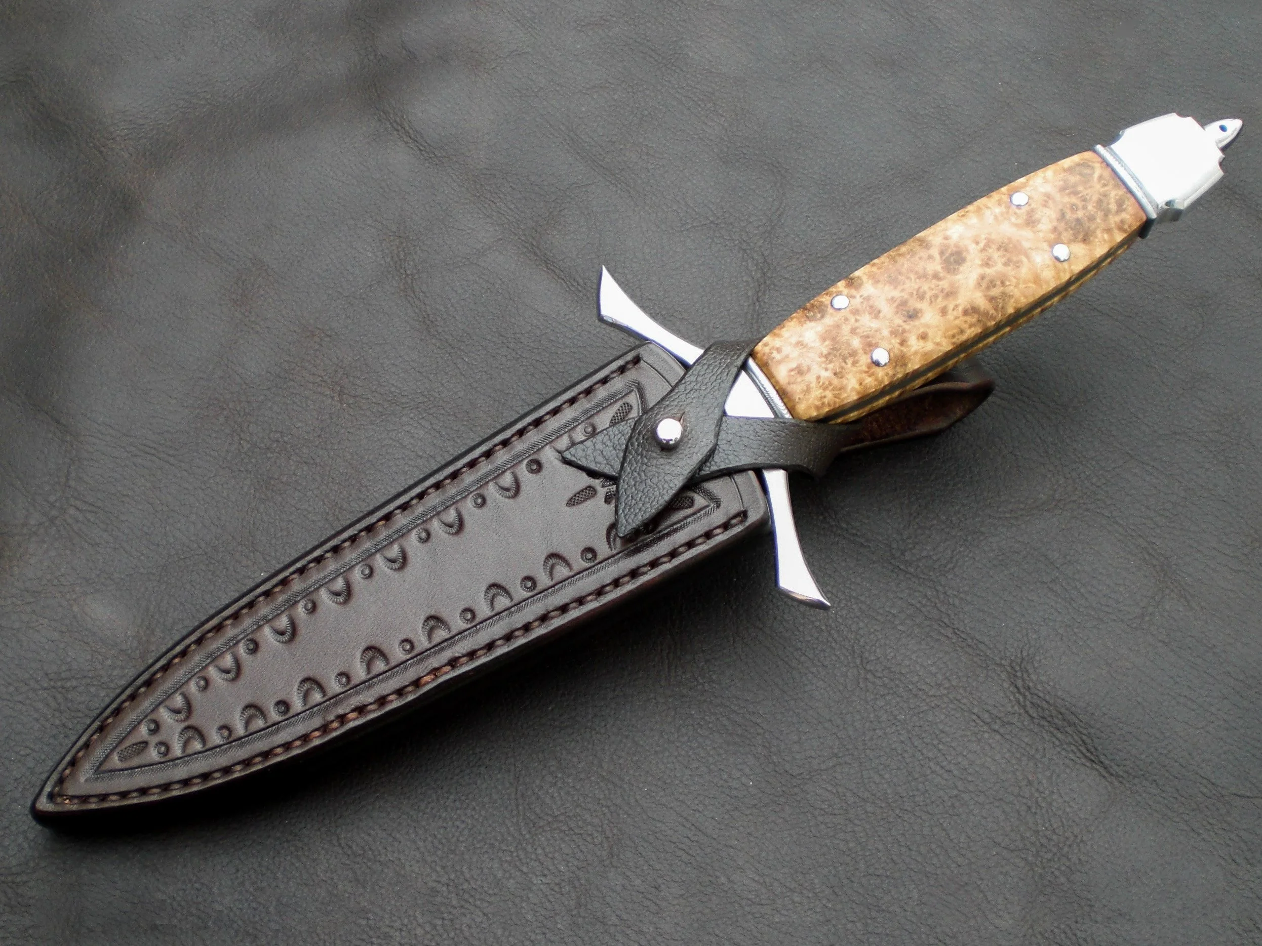 A dagger in the leather sheath.