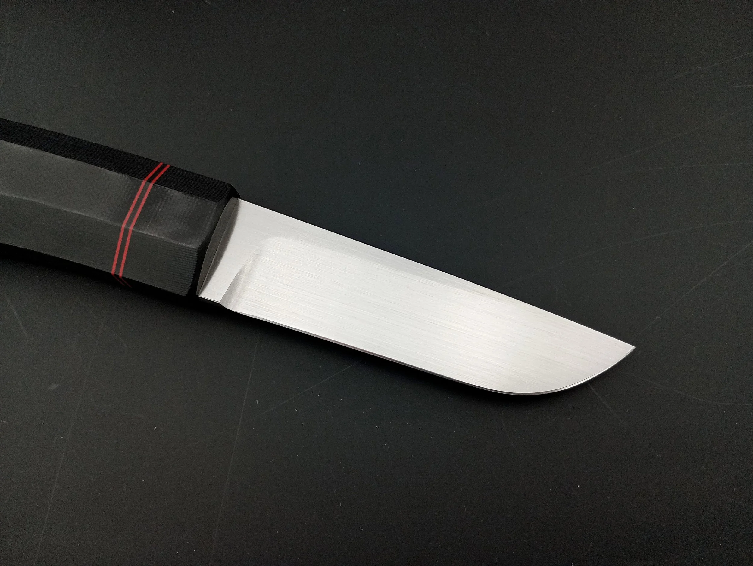A northern knife with a stainless steel blade.