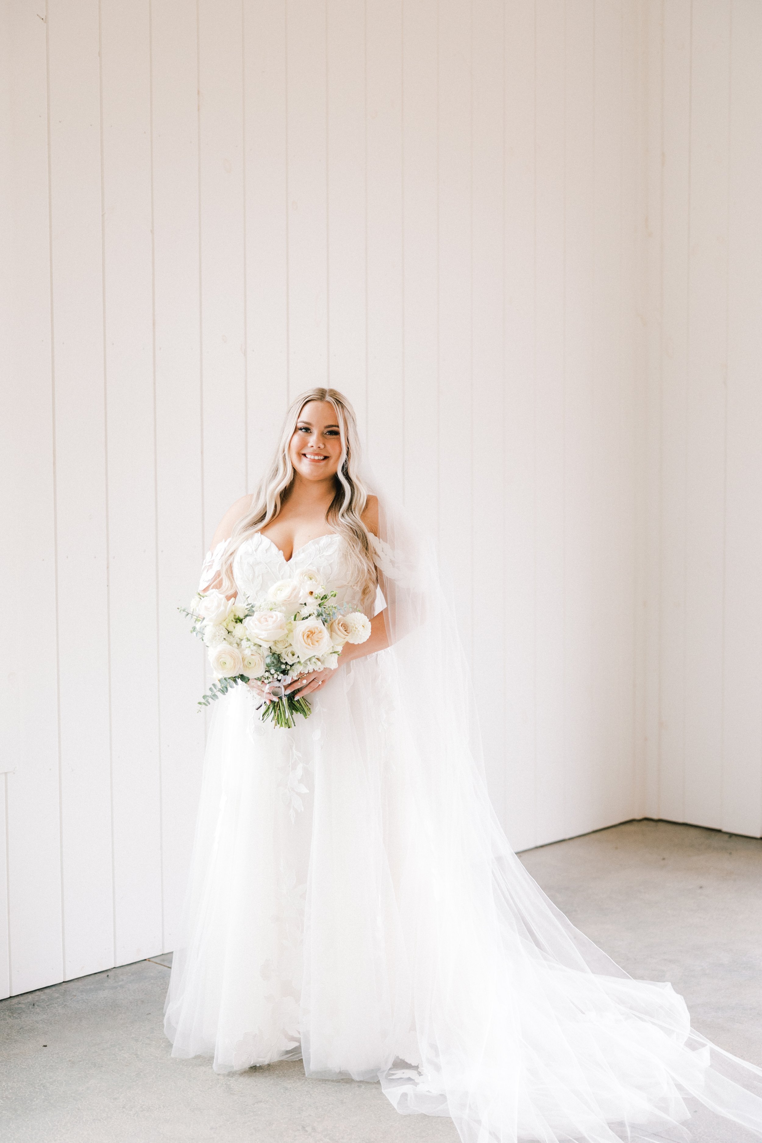 savannah-bride-jessica-in-hattie-lane-by-rebecca-ingram-an-a-line-bridal-gown-with-plunging-neckline-and-oversized-floral-lace-purchased-from-savannah-bridall-shop-ivory-and-beau-1.jpg