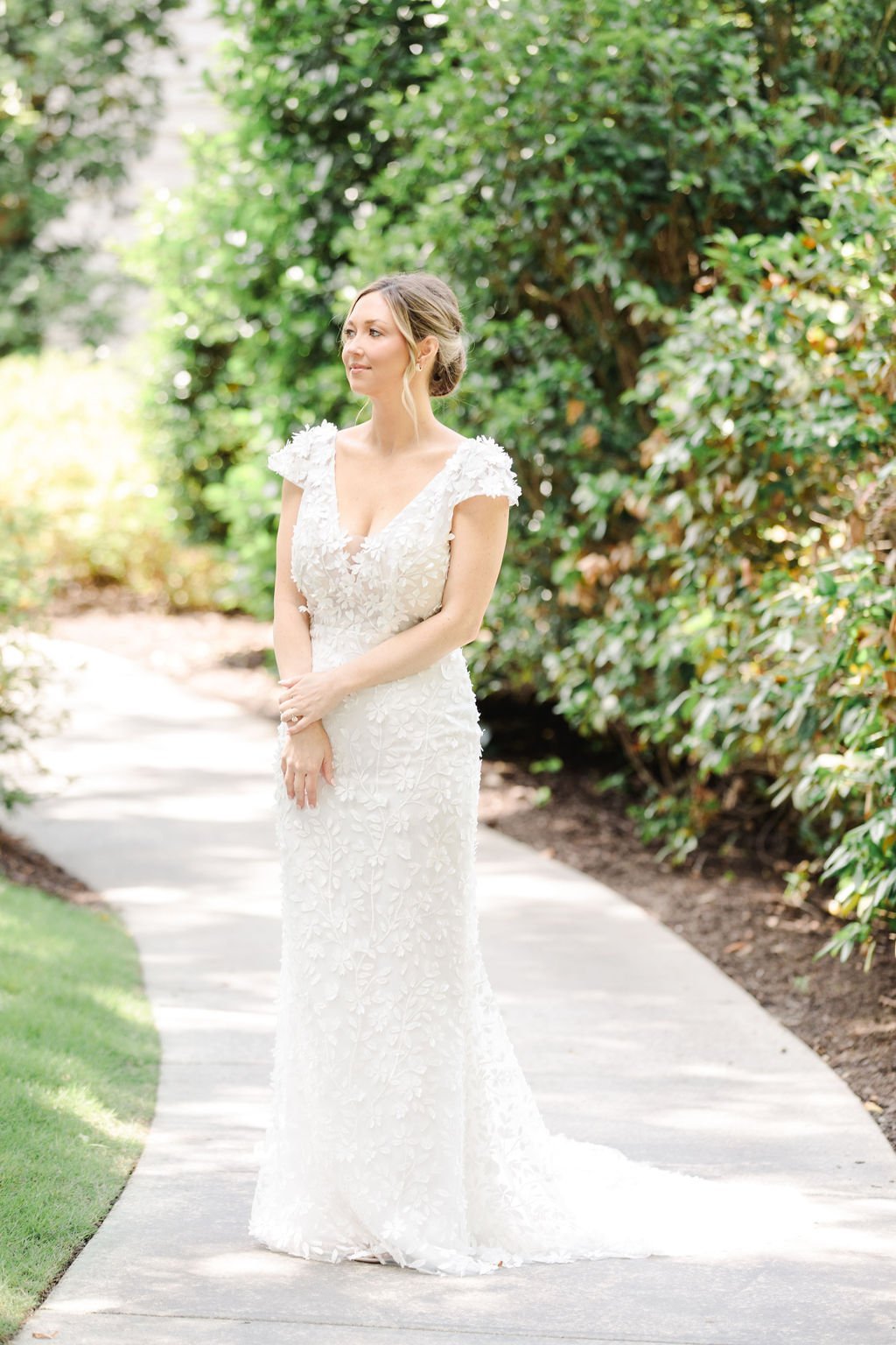 savannah-bride-katelyn-in-darcy-by-made-with-love-a-chic-modern-wedding-dress-witth-cap-sleeves-and-3d-floral-applique-purchased-from-savannah-bridal-shop-ivory-and-beau-3.jpg