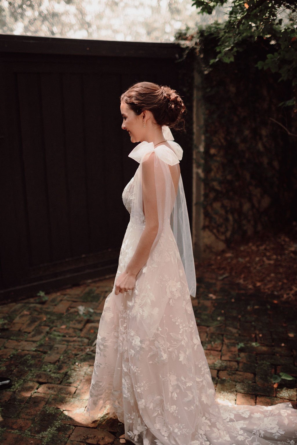 anna-in-the-elsie-gown-by-made-with-love-a-flowy-romantic-modern-lace-wedding-gown-purchased-from-savannah-bridal-shop-ivory-and-beau-2.jpg