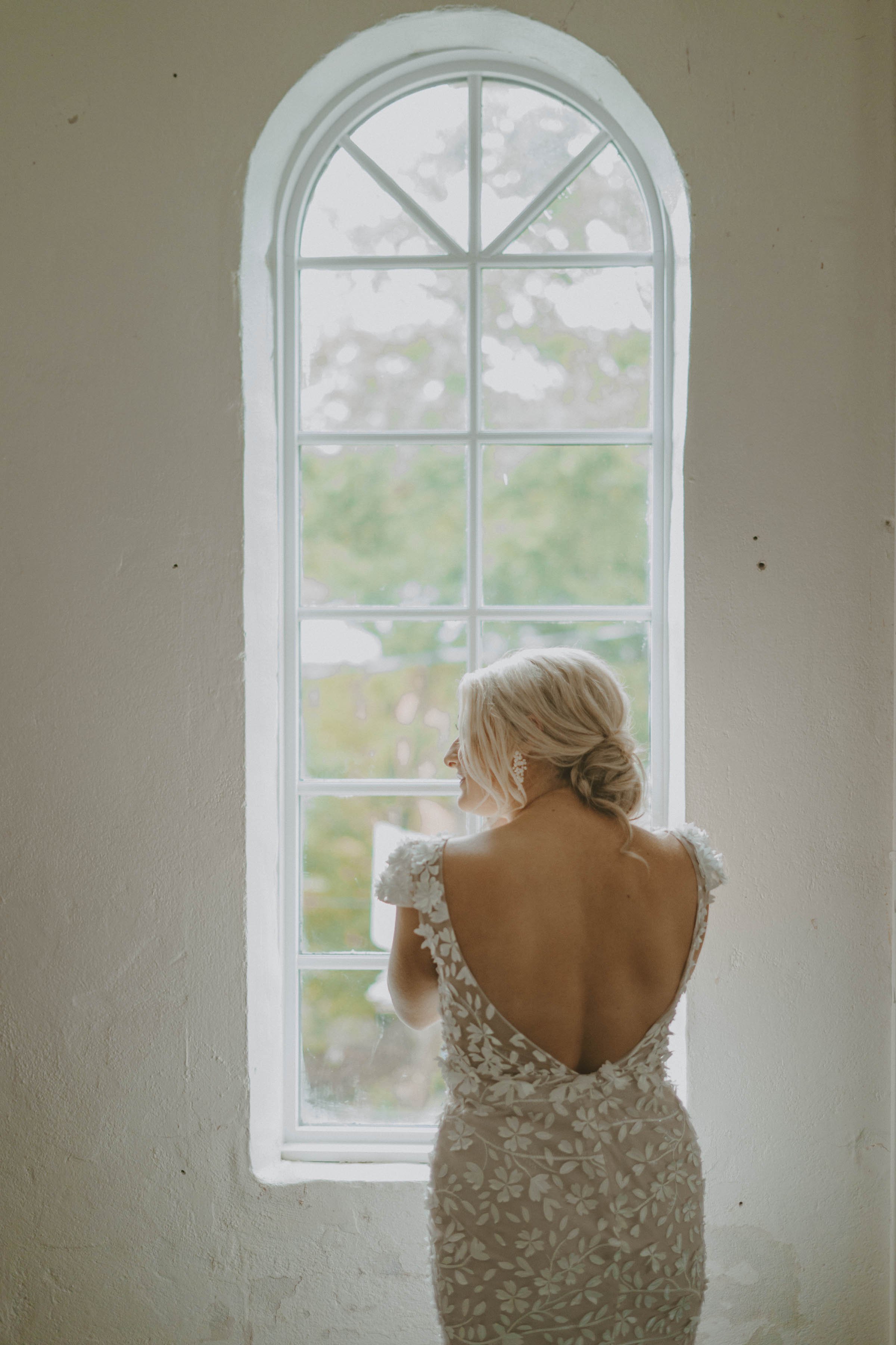ivory-and-beau-bride-claire-in-darcy-by-made-with-love-bridal-a-sleek-modern-fitted-wedding-gown-with-cap-sleeves-a-plunging-illusion-neckline-and-3d-floral-applique-available-from-savanna-bridal-shop-ivory-and-beau-7.jpg