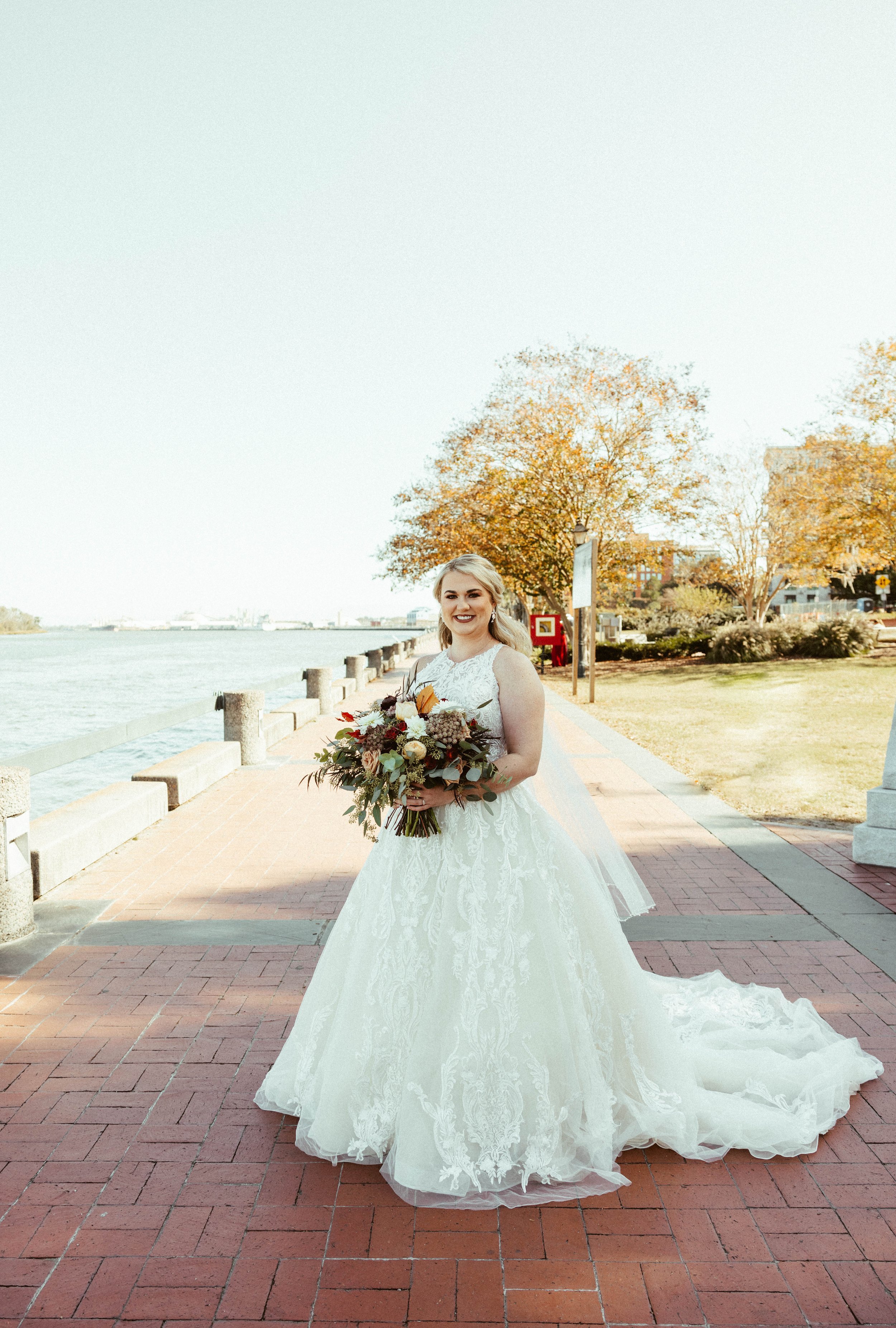 Ivory-and-beau-bride-ansley-bought-sparkly-and-traditional-highneck-ballgown-at-savannah-bridal-shop-gets-married-at-cathedral-with-the-help-of-ivory-and-beau-who-created-floral-peices-for-the-ceremony-and-reception-in-their-savannah-florwer-shop-29.jpg