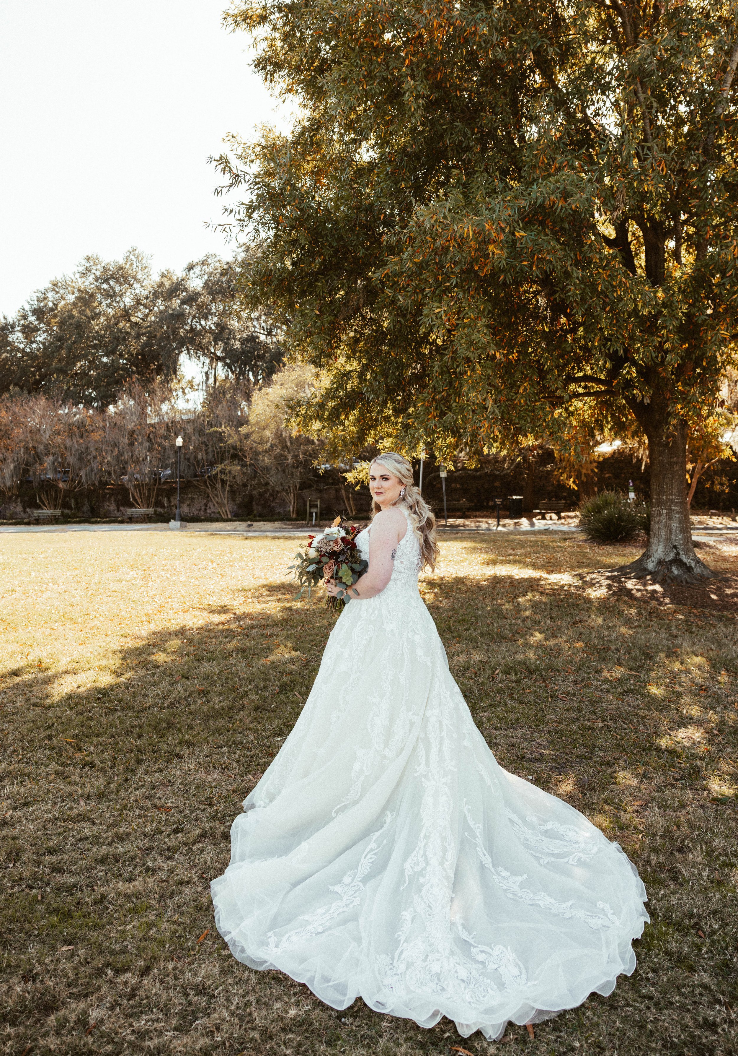 Ivory-and-beau-bride-ansley-bought-sparkly-and-traditional-highneck-ballgown-at-savannah-bridal-shop-gets-married-at-cathedral-with-the-help-of-ivory-and-beau-who-created-floral-peices-for-the-ceremony-and-reception-in-their-savannah-florwer-shop-33.jpg