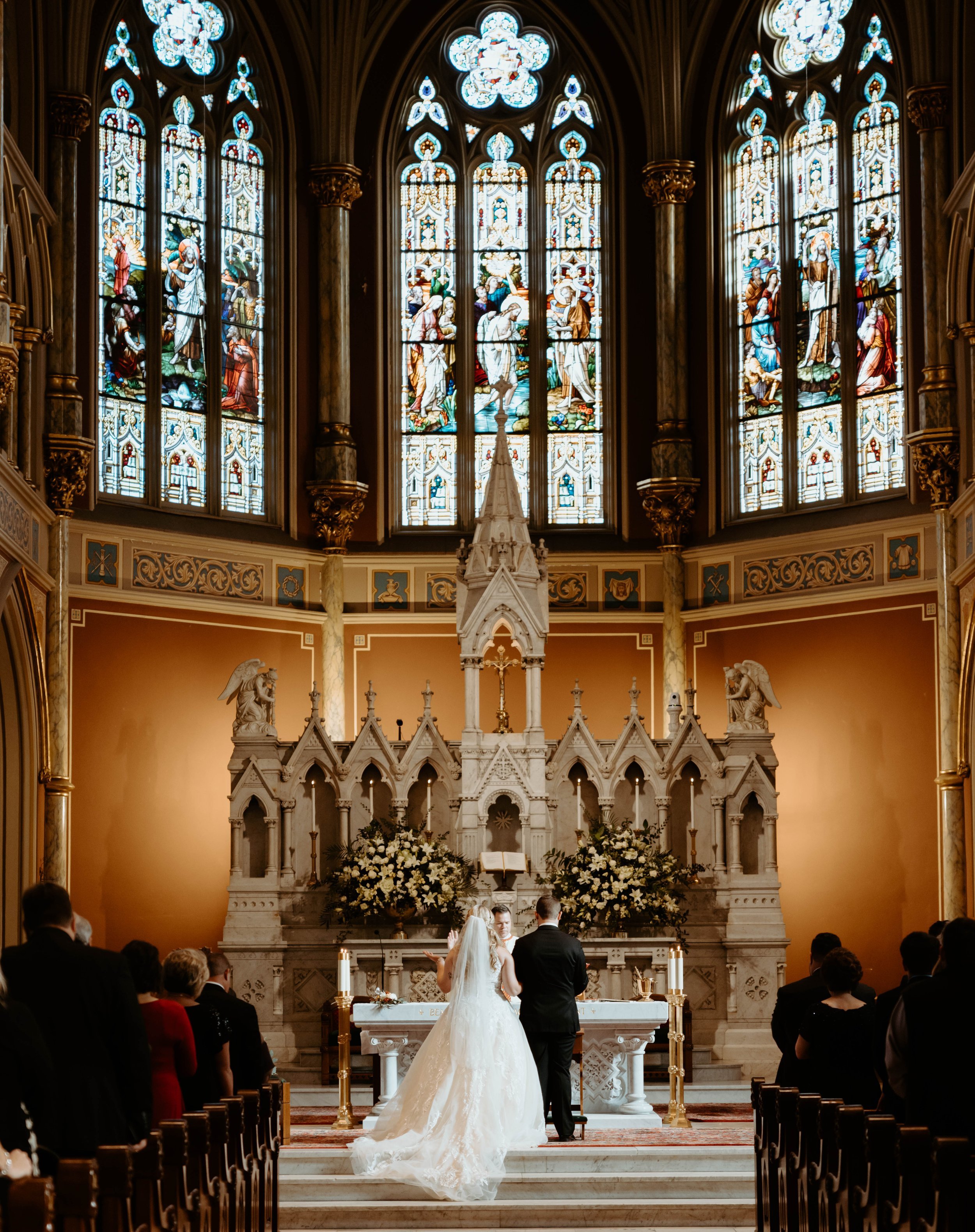 Ivory-and-beau-bride-ansley-bought-sparkly-and-traditional-highneck-ballgown-at-savannah-bridal-shop-gets-married-at-cathedral-with-the-help-of-ivory-and-beau-who-created-floral-peices-for-the-ceremony-and-reception-in-their-savannah-florwer-shop-39.jpg