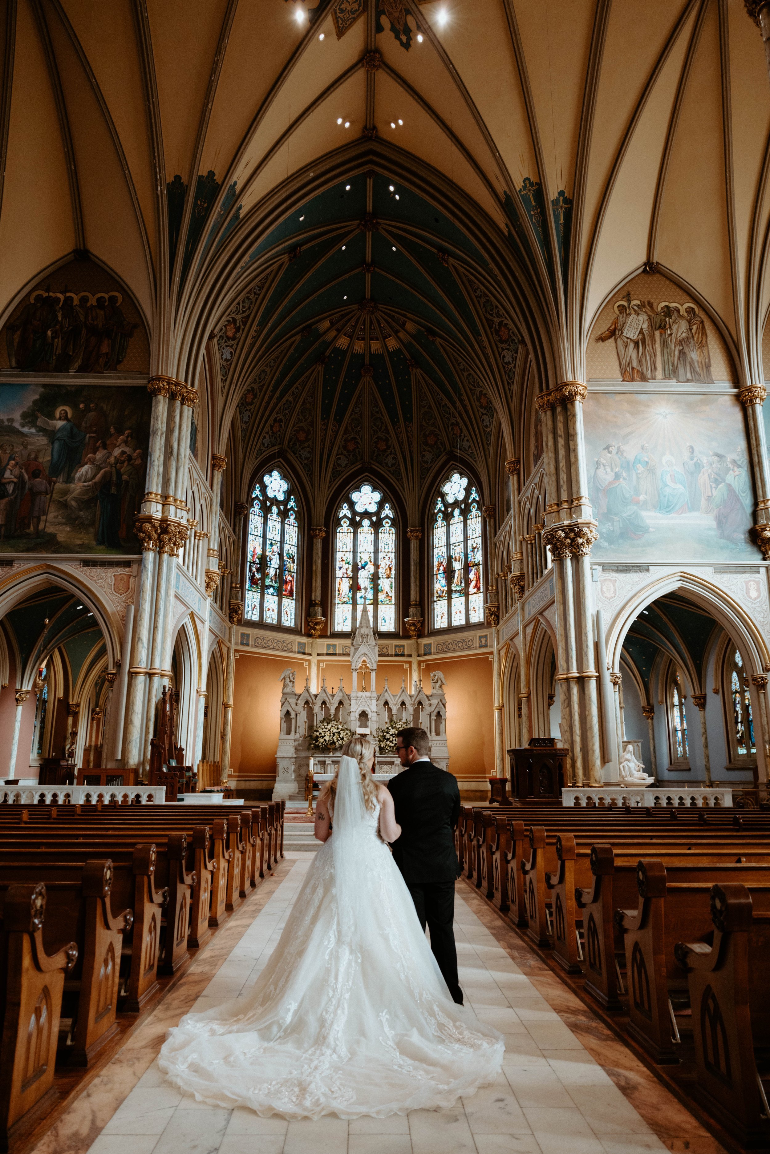 Ivory-and-beau-bride-ansley-bought-sparkly-and-traditional-highneck-ballgown-at-savannah-bridal-shop-gets-married-at-cathedral-with-the-help-of-ivory-and-beau-who-created-floral-peices-for-the-ceremony-and-reception-in-their-savannah-florwer-shop-8.jpg