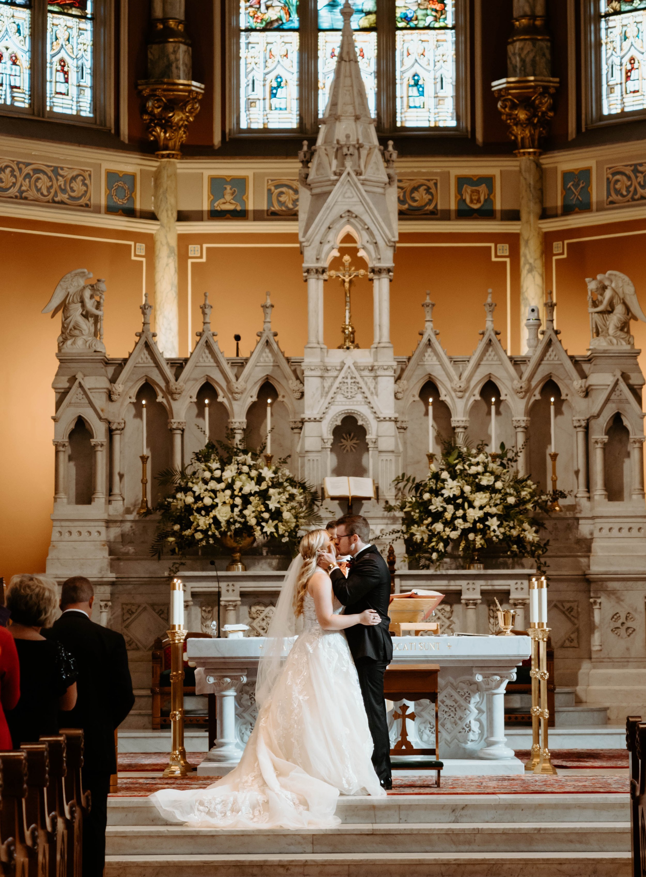 Ivory-and-beau-bride-ansley-bought-sparkly-and-traditional-highneck-ballgown-at-savannah-bridal-shop-gets-married-at-cathedral-with-the-help-of-ivory-and-beau-who-created-floral-peices-for-the-ceremony-and-reception-in-their-savannah-florwer-shop-40.jpg