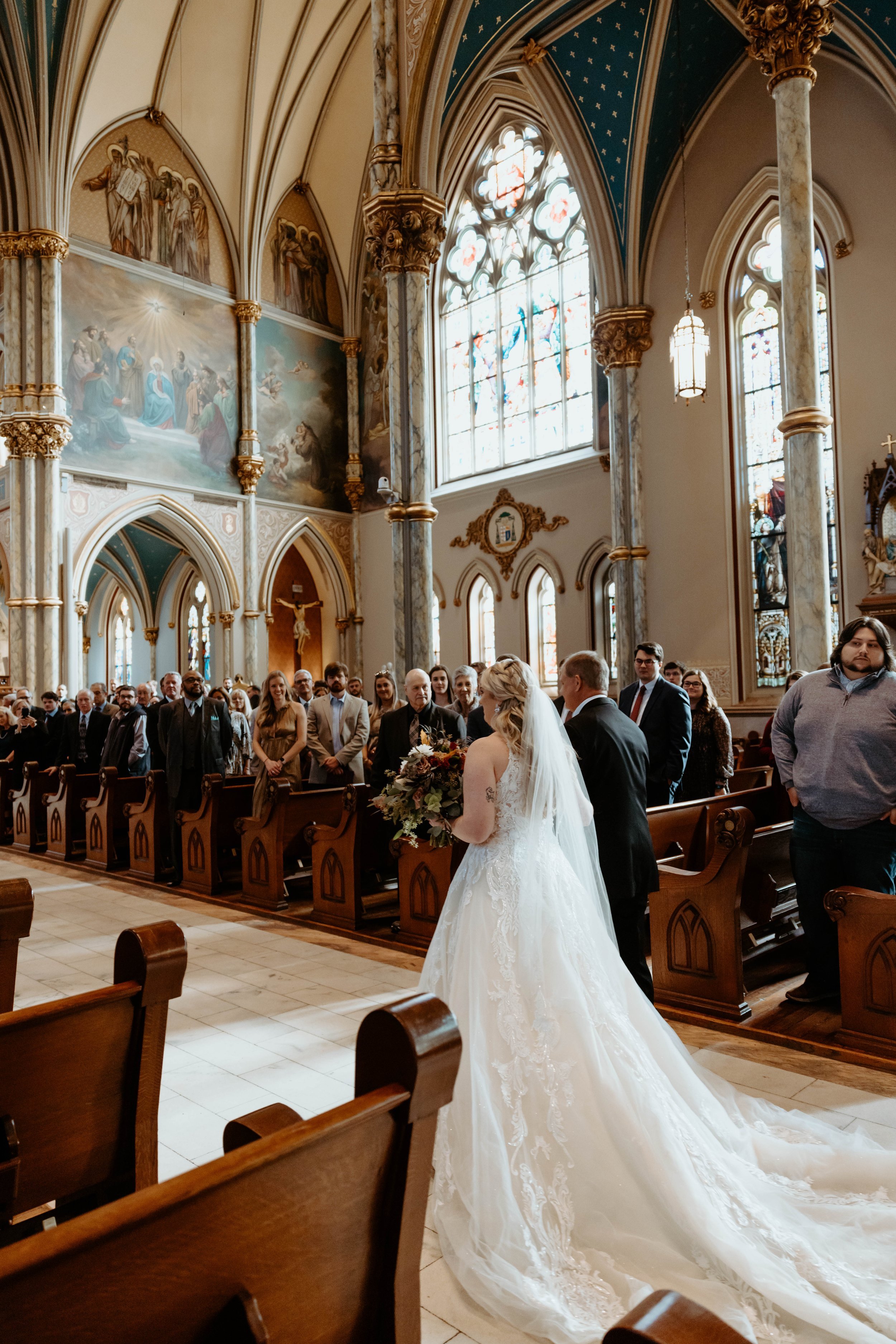 Ivory-and-beau-bride-ansley-bought-sparkly-and-traditional-highneck-ballgown-at-savannah-bridal-shop-gets-married-at-cathedral-with-the-help-of-ivory-and-beau-who-created-floral-peices-for-the-ceremony-and-reception-in-their-savannah-florwer-shop-38.jpg