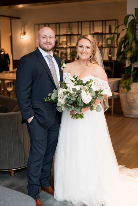 Ivory-and-beau-bride-sara-kate-in-rebecca-ingram-nia-gown-with-bracken-off-the-shoulder-sleeves-purchased-at-savannah-bridal-gown-shop-with-floarls-perfectly-currated-specifically-for-sara-kate-by-ivory-and-beau-a-savannah-florist-12.png