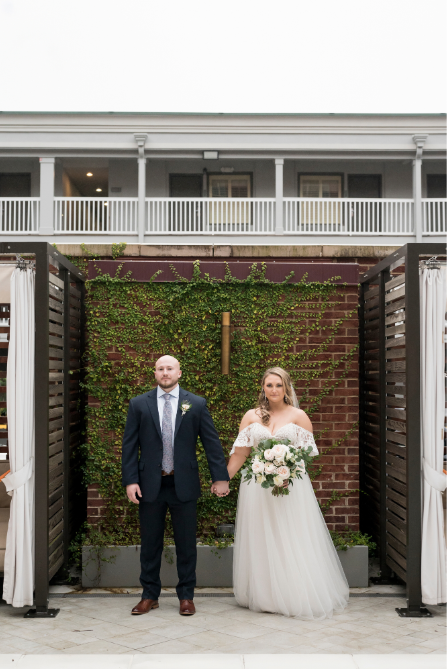 Ivory-and-beau-bride-sara-kate-in-rebecca-ingram-nia-gown-with-bracken-off-the-shoulder-sleeves-purchased-at-savannah-bridal-gown-shop-with-floarls-perfectly-currated-specifically-for-sara-kate-by-ivory-and-beau-a-savannah-florist-13.png