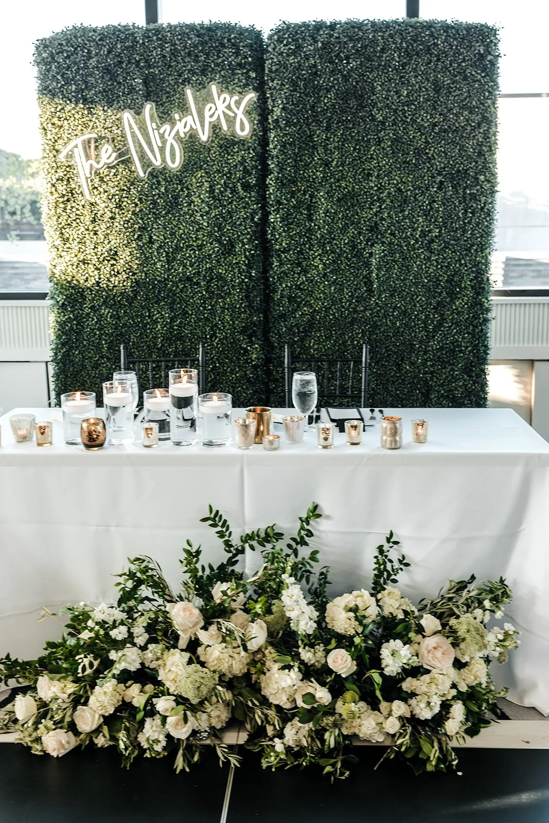 macie-banks-cam-niziliak-wedding-highway-xm-sirius-radio-host-wedding-to-nfl-player-perry-lane-hotel-ivory-and-beau-savannah-florist-savannah-wedding-flowers-greenery-wall-sweetheart-table-design.jpg