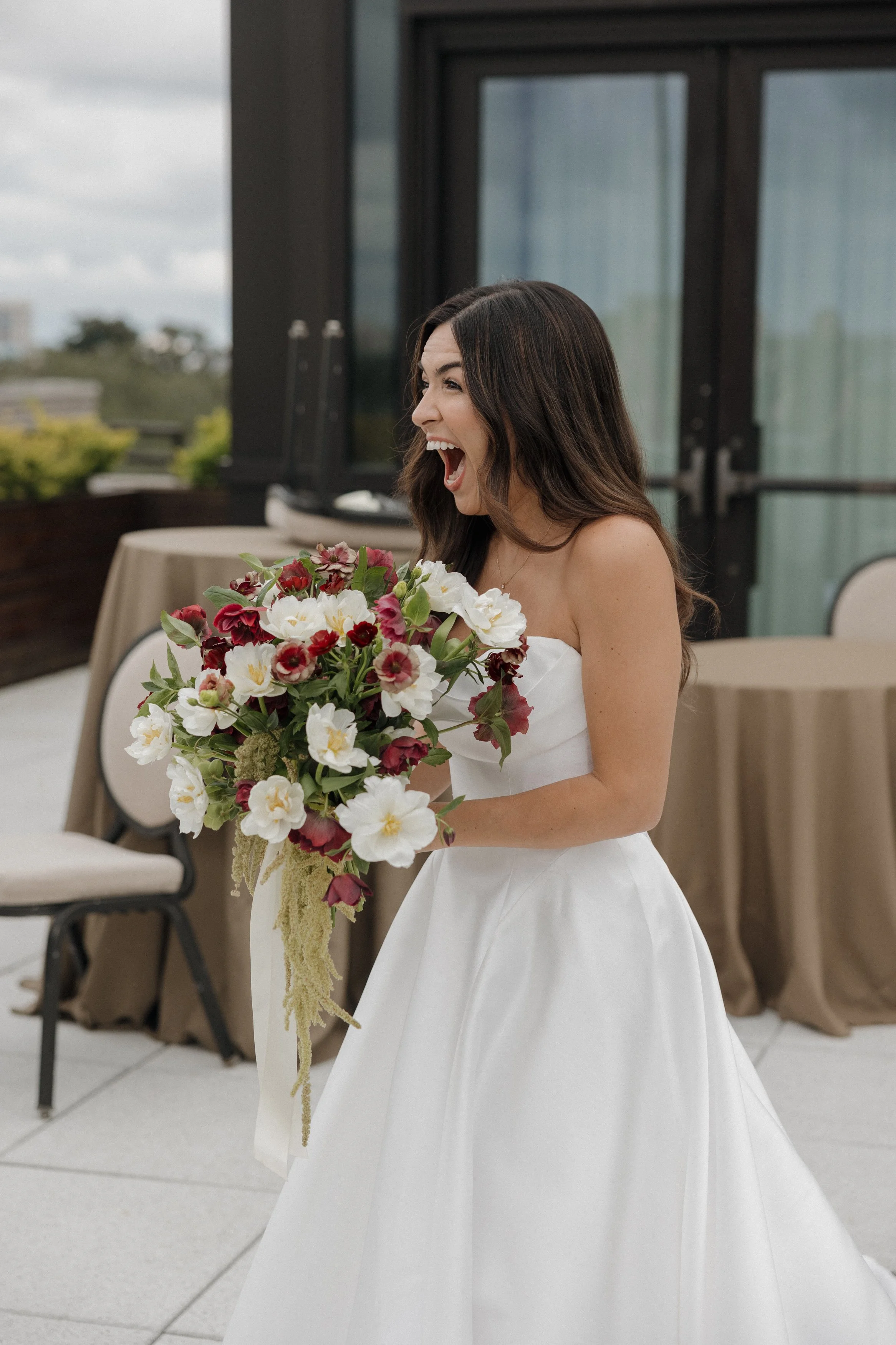 southern-wedding-at-the-perry-lane-hotel-boutique-hotels-for-weddings-in-savannah-georgia-lowcountry-wedding-inspiration-first-look-with-bridesmaids-burgundy-and-ivory-wedding-flowers-savannah-weddings.jpg