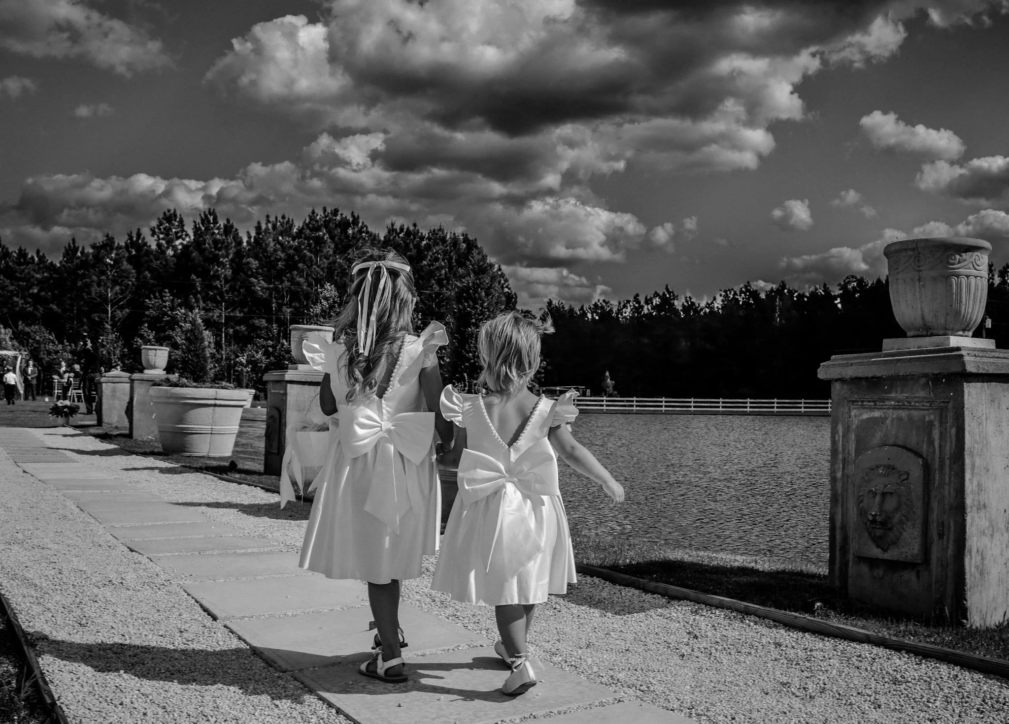 adorable-flowergirls-with-big-bows-on-their-dresses-southern-flowergirl-southern-wedding-southern-ivory-and-beau-savannah-wedding-inspiration.jpeg