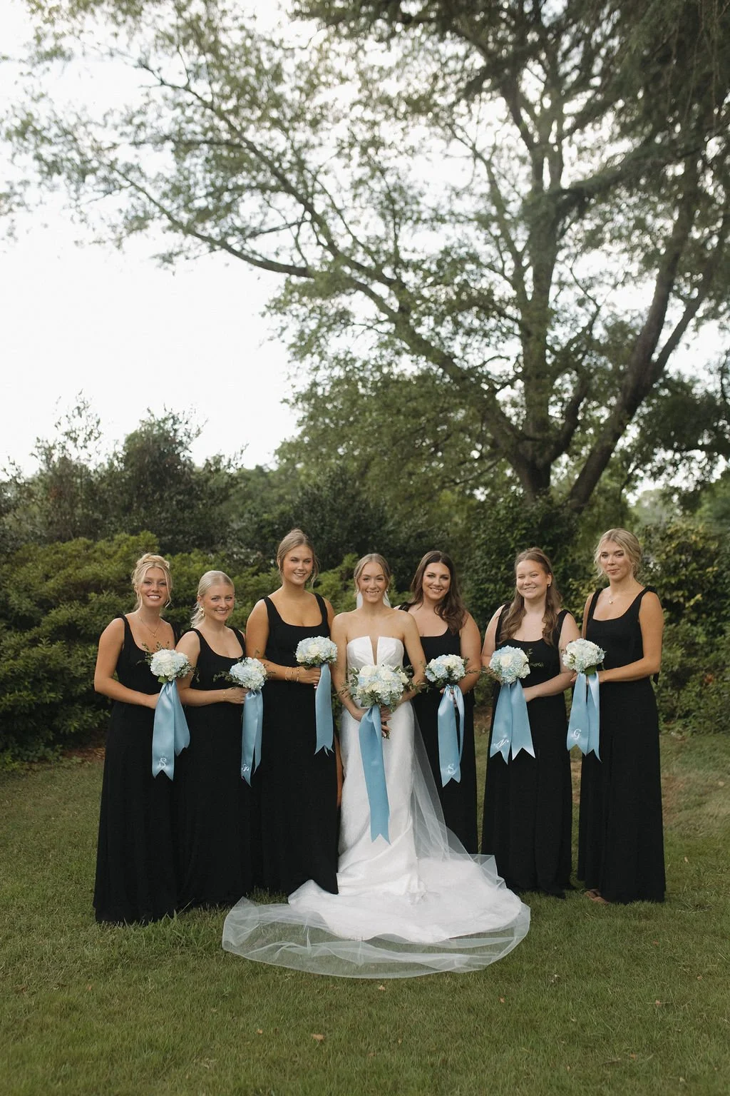 black-white-and-blue-wedding-ivory-and-beau-savannah-bridal-boutique-savannah-wedding-dresses-noor-by-locket-by-watters-southern-classic-bride-southern-wedding-inspiration-black-bridesmaids-dresses.jpg