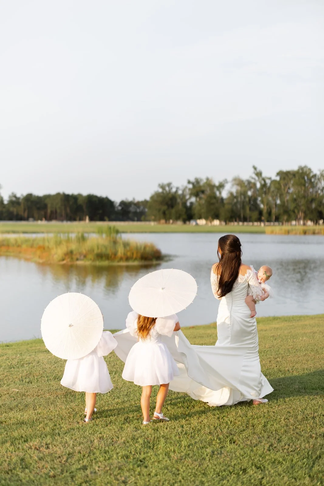 bride with flowergirls southern wedding at chateau 1800 jessa by justin alexander southern wedding inspiration.jpg
