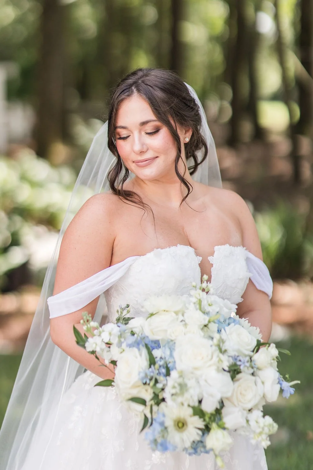 southern bride with blue and white bridal bouquet.jpg