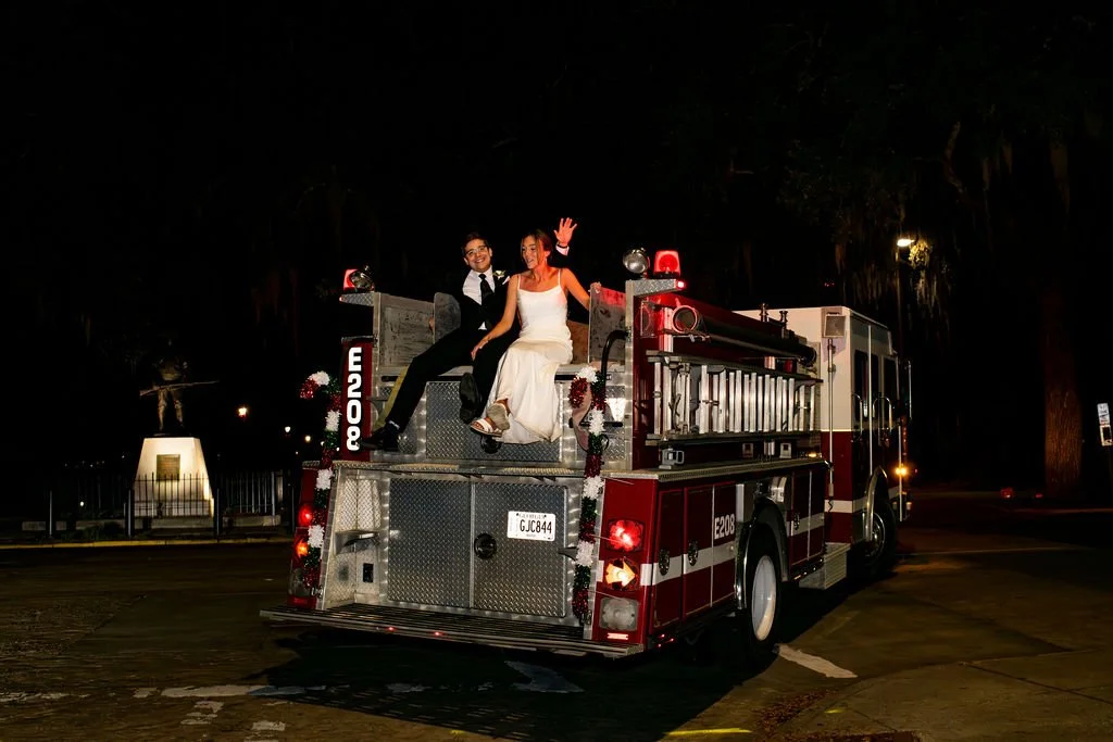ivory-and-beau-weddings-get-a-away-car-send-offs-savannah-weddings-firetruck-firefighter-wedding-southern-weddings-gowns.jpg