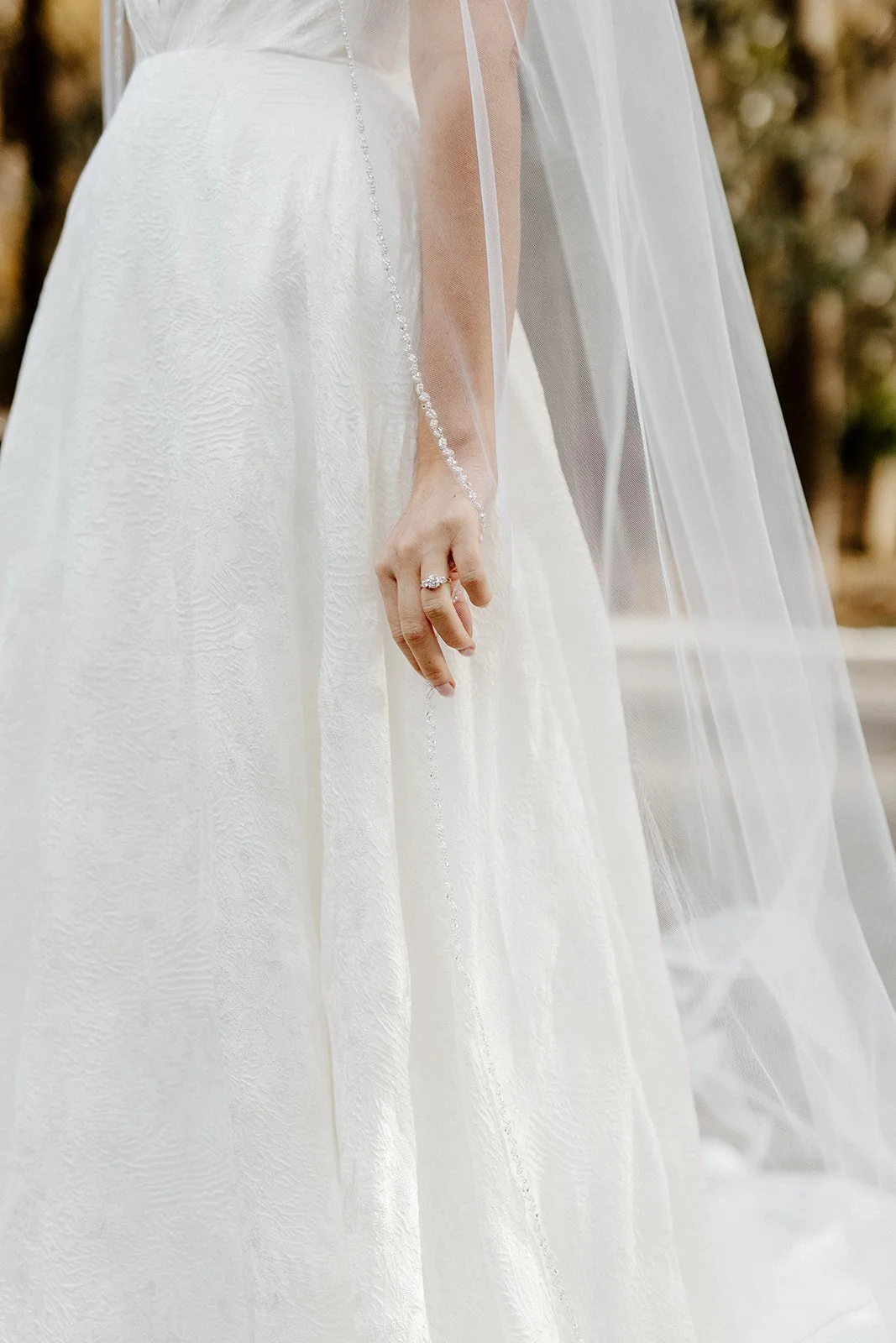 ivory-and-beau-savannah-georgia-wedding-dresses-southern-weddings-mackey-house-pink-florals-luxury-wedding-florals-wedding-gown-fabric.jpg