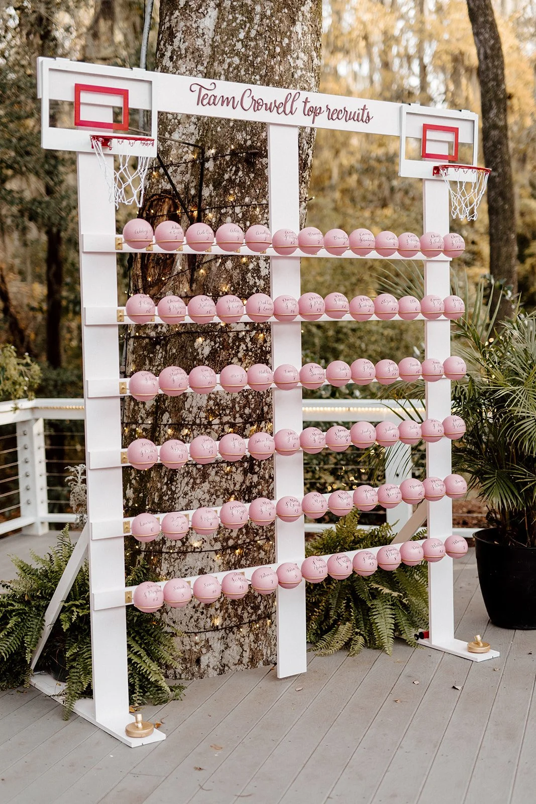 ivory-and-beau-savannah-georgia-wedding-dresses-southern-weddings-mackey-house-pink-florals-luxury-wedding-florals-reception-cake-florals-seating-chart-basketball-wedding-cocktail-hour.jpg
