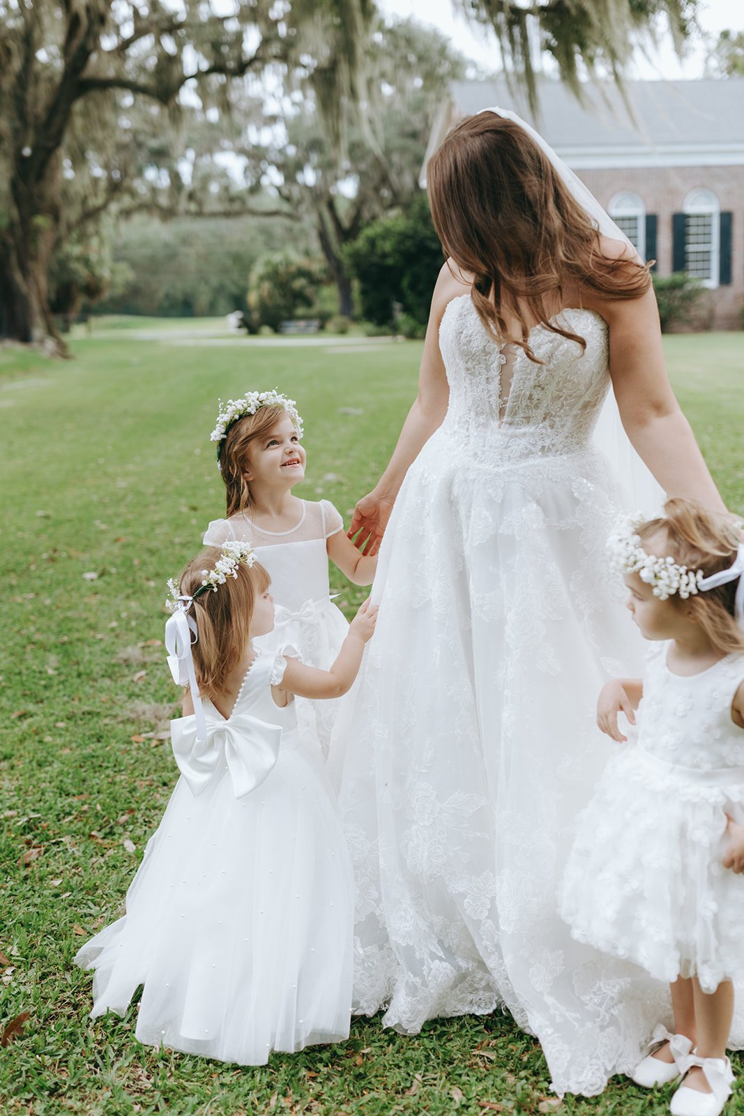 maggie sottero bride with flowergirls.jpg