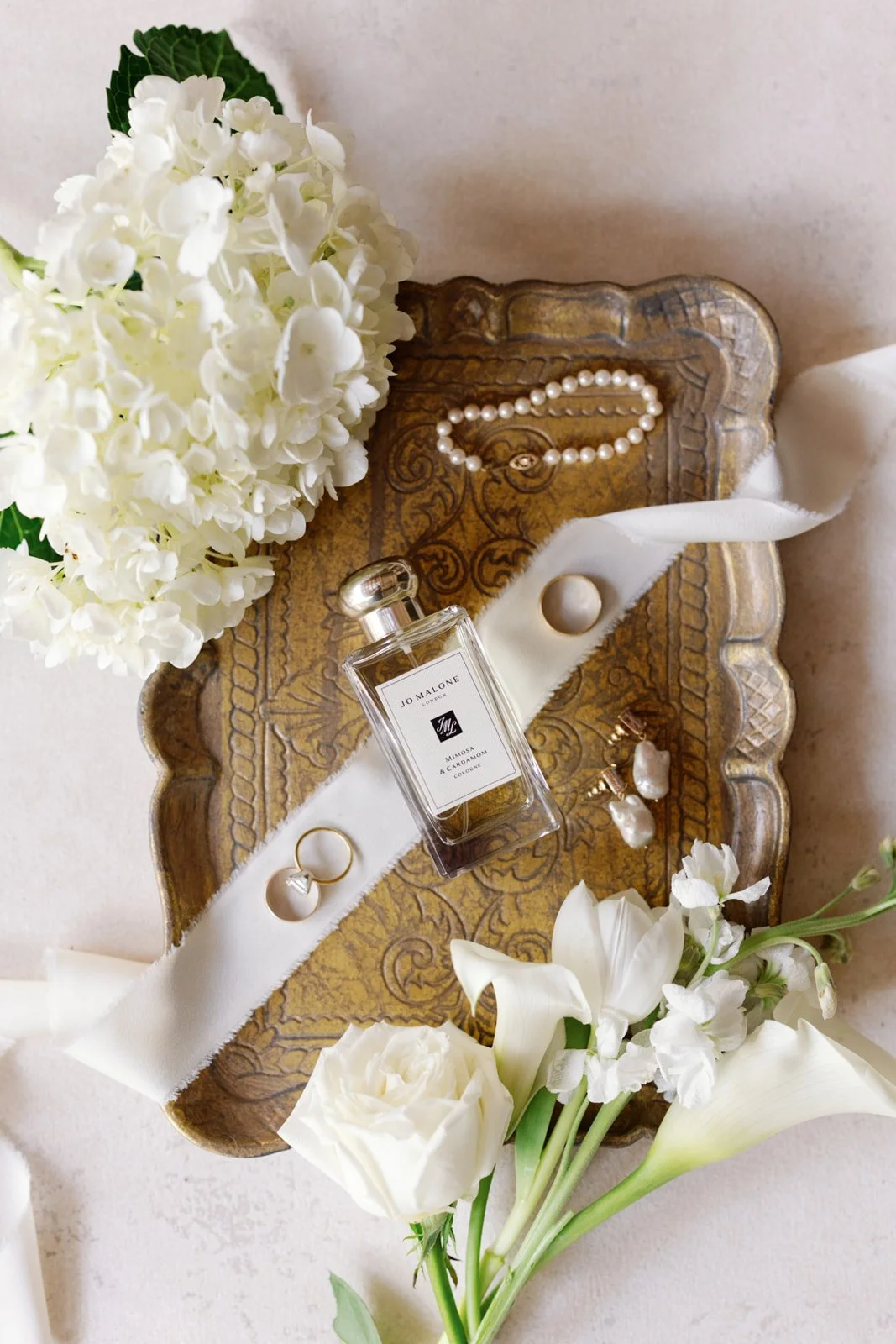 luxury-bridal-flat-lay-white-wedding-flowers-gold-details.jpg