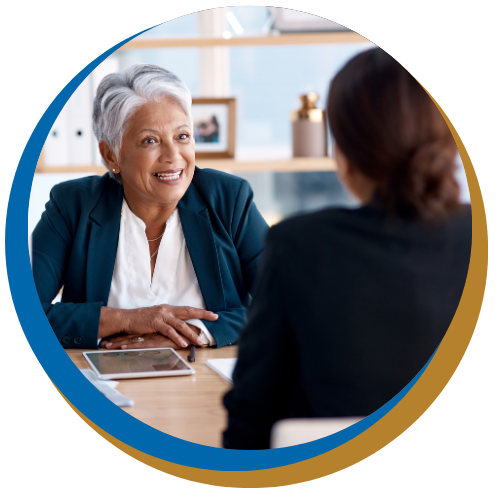 Business professional talking to peer
