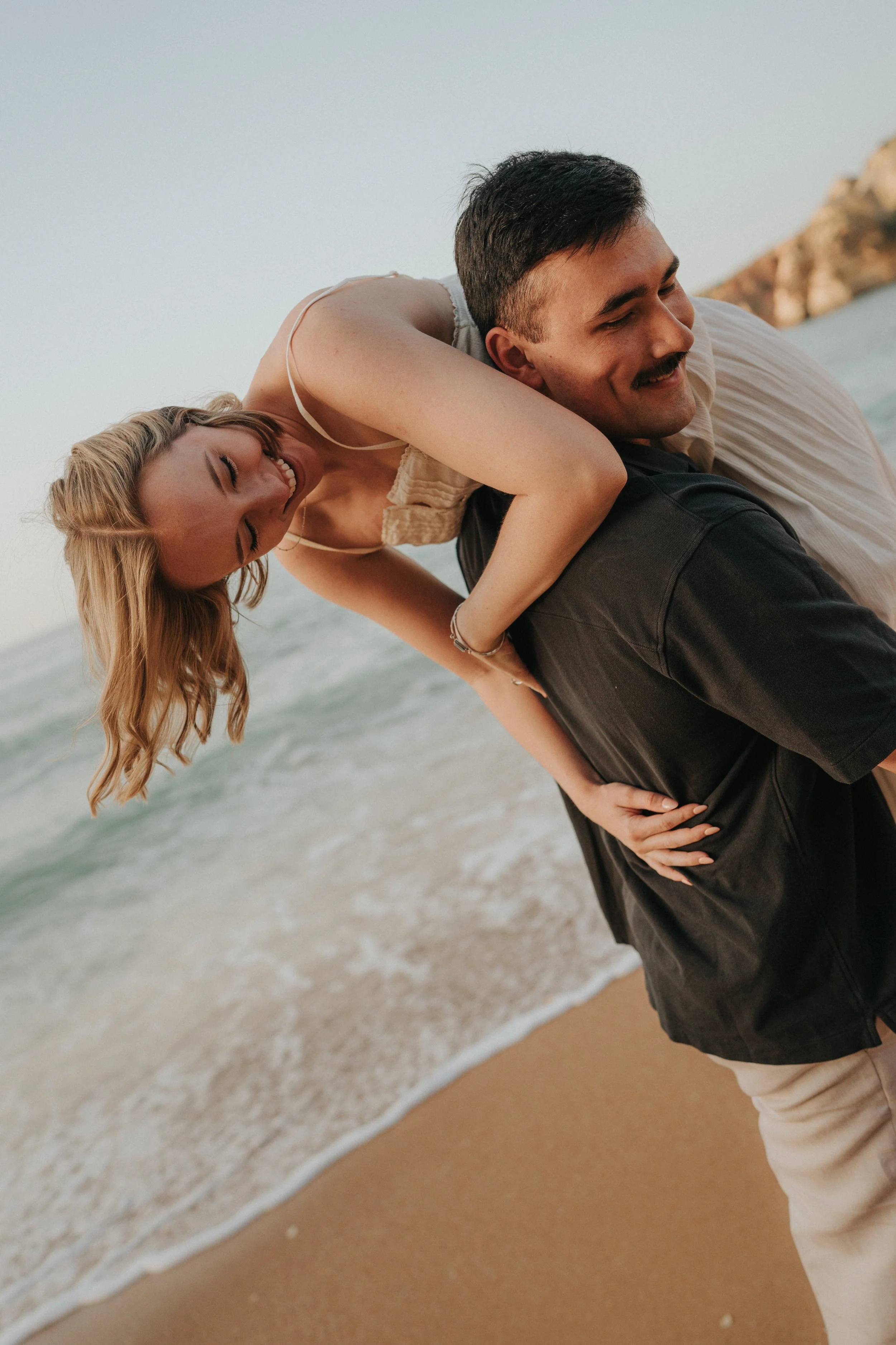 Sunrise engagement session at Praia Dona Ana