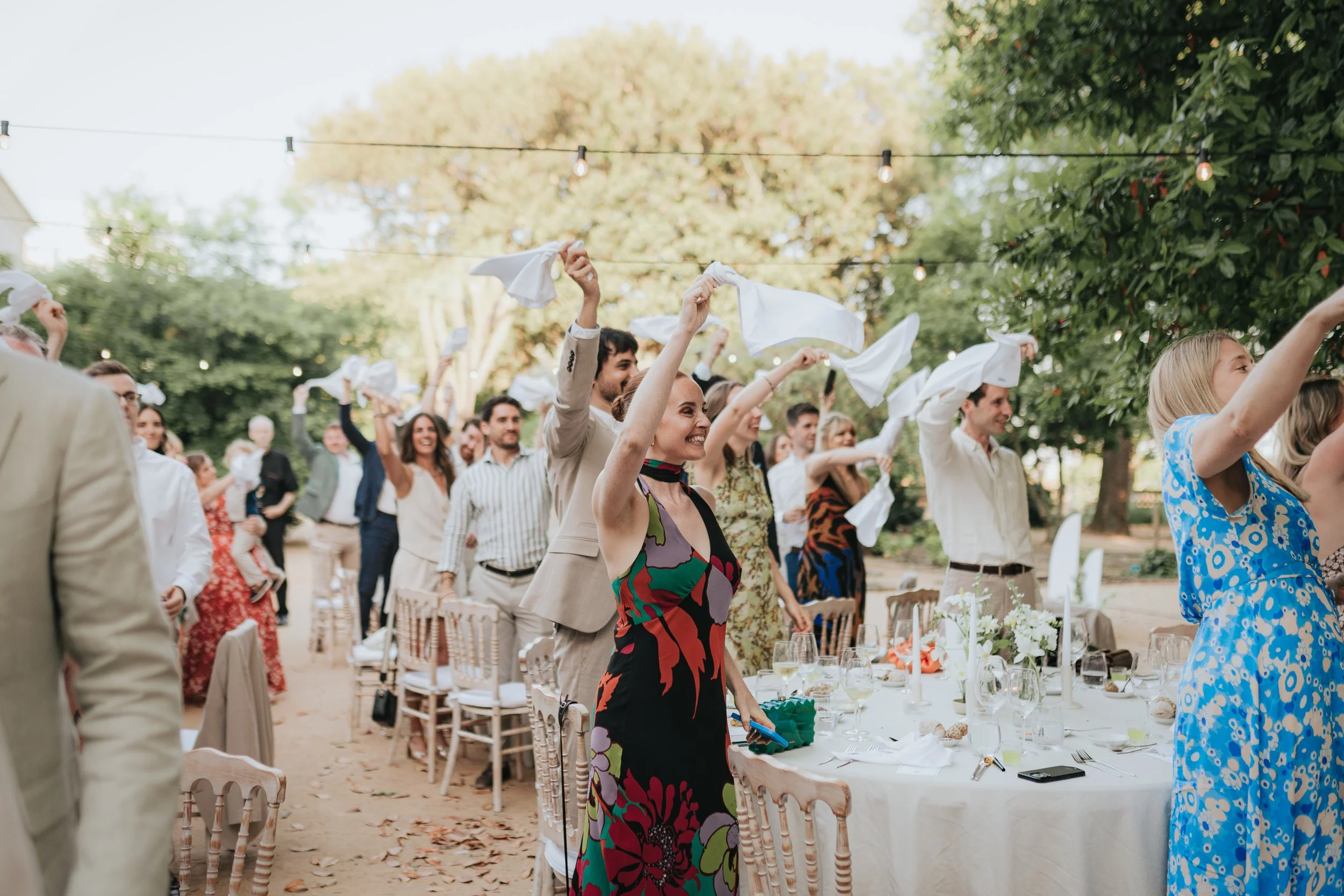 Wedding guests celebrating at Vandelli Botanical Garden in Lisbon