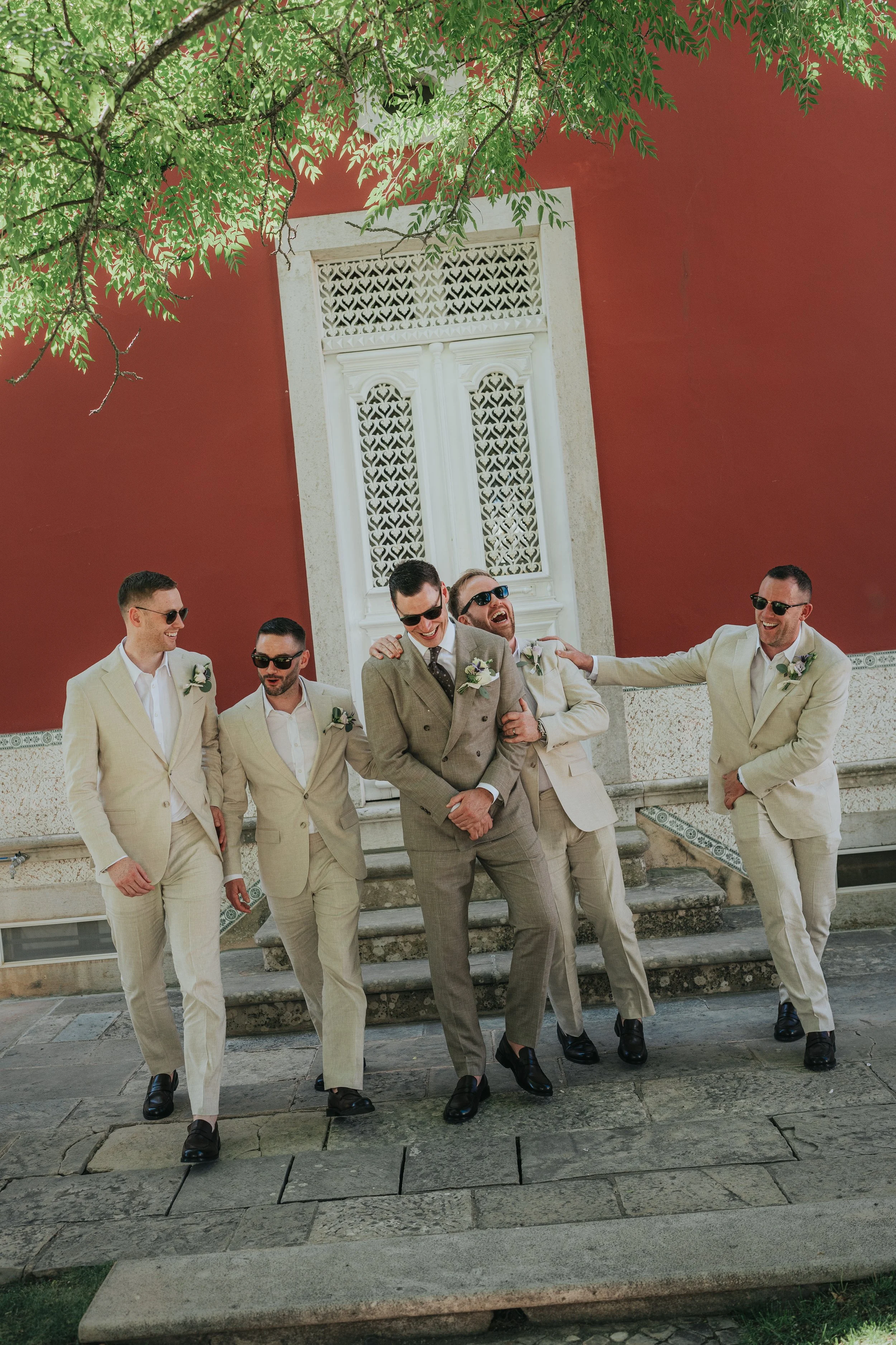 Happy groom with his groomsmen 