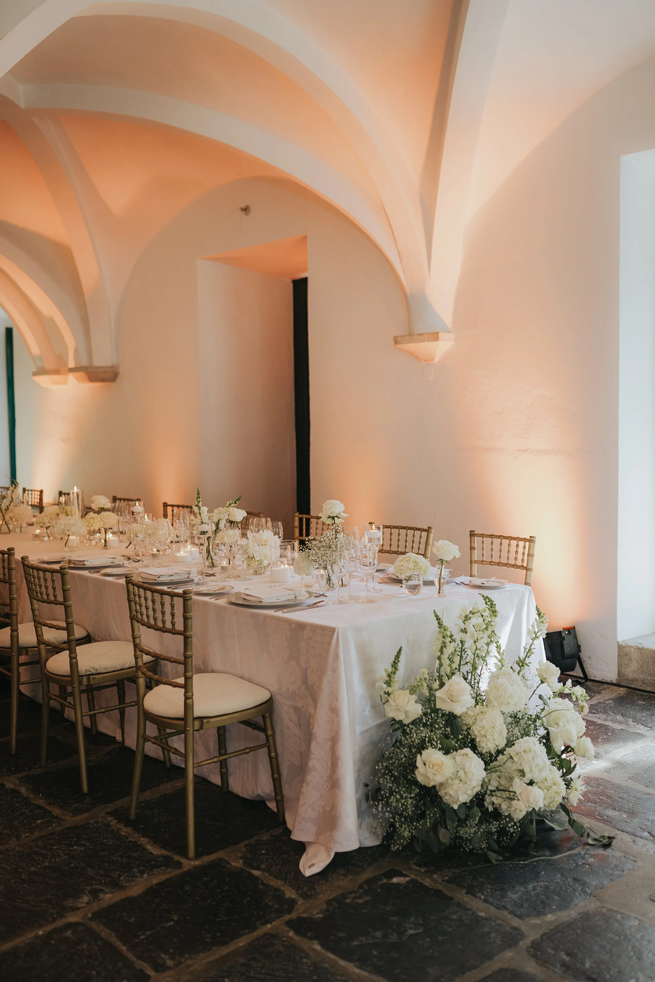 White floral wedding decoration with candles at Penha Longa in Sintra